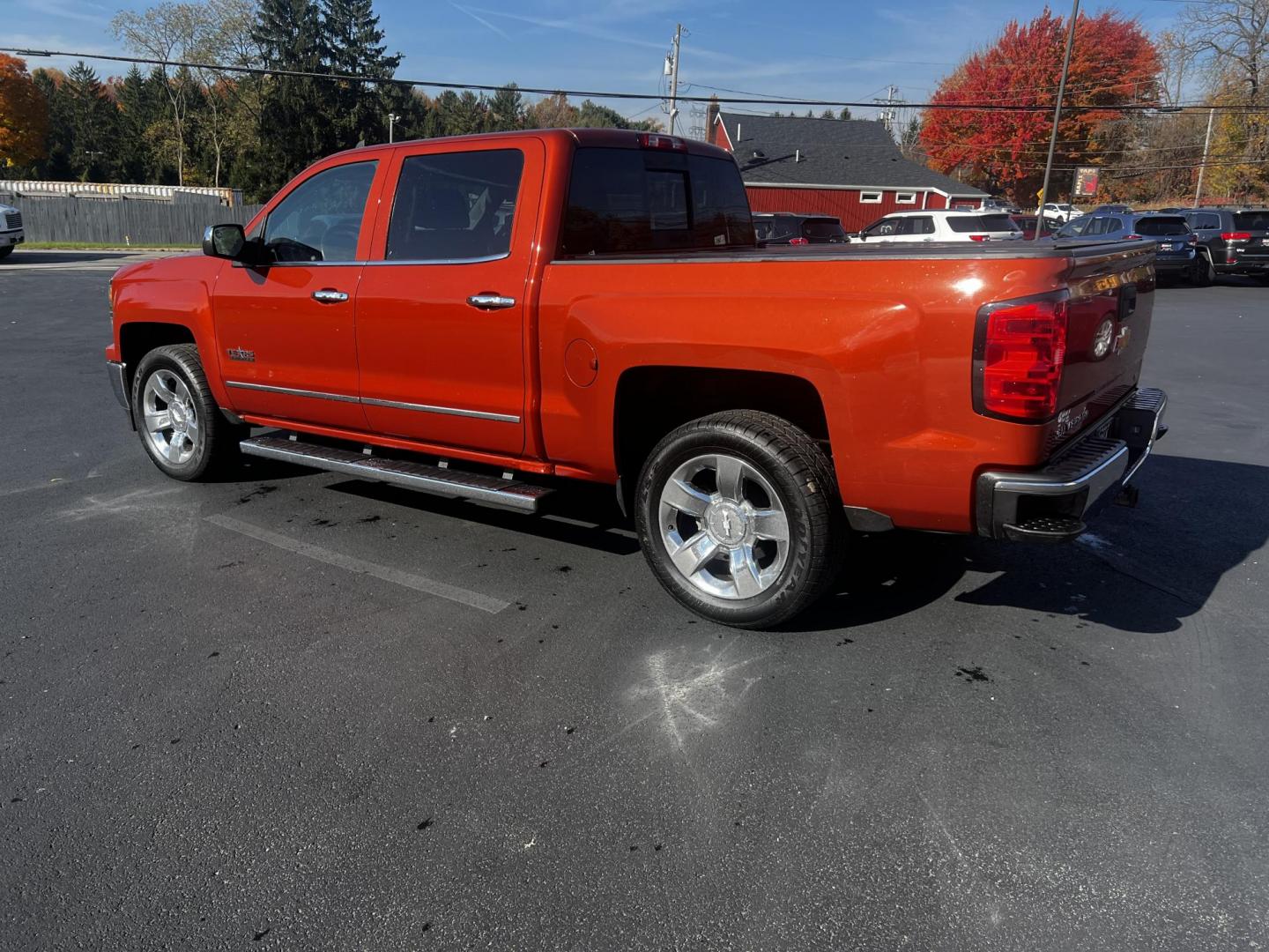 2015 Orange /Black Chevrolet Silverado 1500 LTZ Crew Cab 4WD (3GCUKSEC8FG) with an 5.3L V8 OHV 16V engine, 6-Speed Automatic transmission, located at 11115 Chardon Rd. , Chardon, OH, 44024, (440) 214-9705, 41.580246, -81.241943 - Photo#11