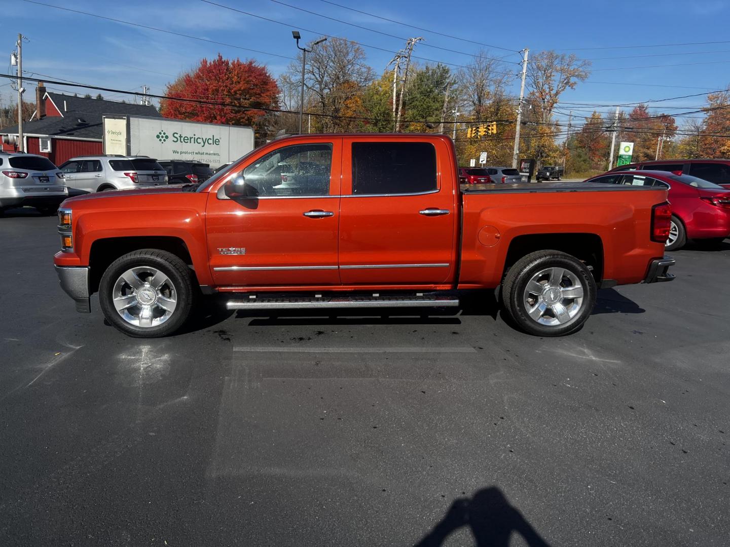 2015 Orange /Black Chevrolet Silverado 1500 LTZ Crew Cab 4WD (3GCUKSEC8FG) with an 5.3L V8 OHV 16V engine, 6-Speed Automatic transmission, located at 11115 Chardon Rd. , Chardon, OH, 44024, (440) 214-9705, 41.580246, -81.241943 - Photo#13