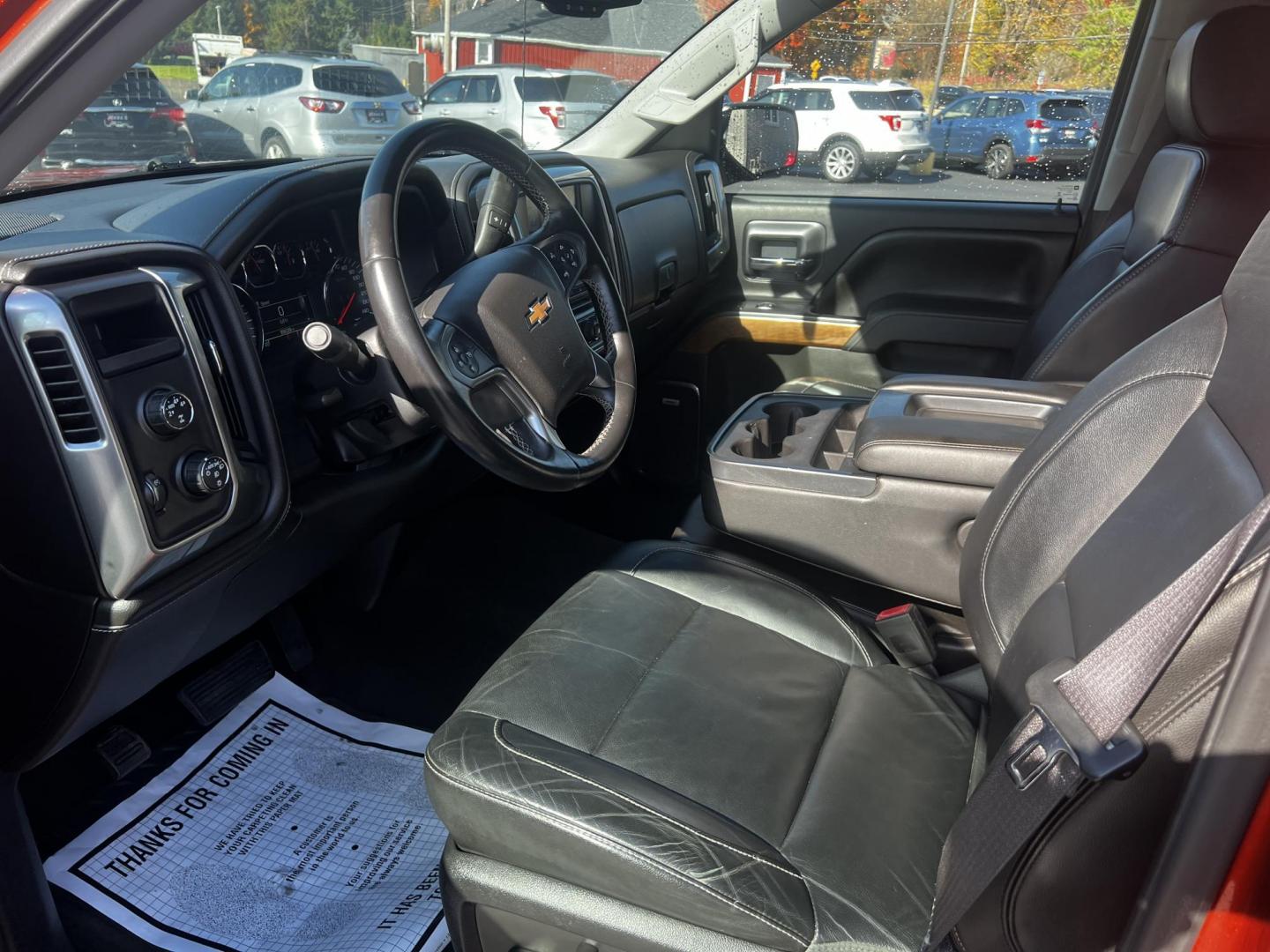 2015 Orange /Black Chevrolet Silverado 1500 LTZ Crew Cab 4WD (3GCUKSEC8FG) with an 5.3L V8 OHV 16V engine, 6-Speed Automatic transmission, located at 11115 Chardon Rd. , Chardon, OH, 44024, (440) 214-9705, 41.580246, -81.241943 - Photo#16