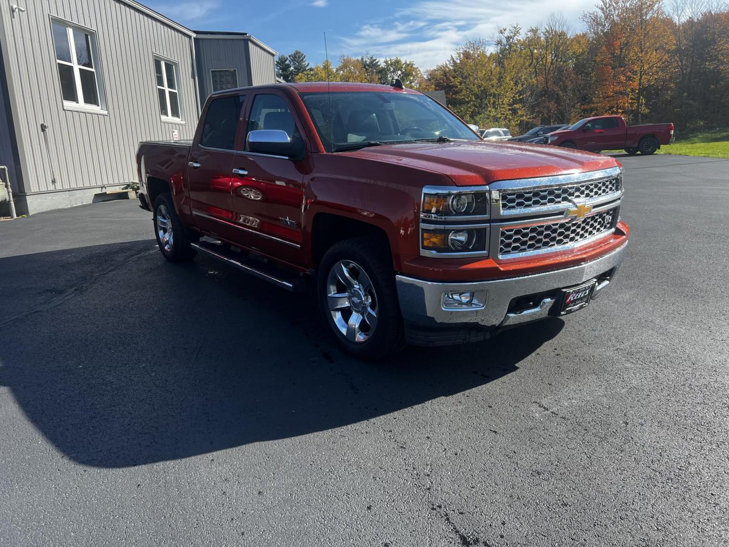 2015 Orange /Black Chevrolet Silverado 1500 LTZ Crew Cab 4WD (3GCUKSEC8FG) with an 5.3L V8 OHV 16V engine, 6-Speed Automatic transmission, located at 11115 Chardon Rd. , Chardon, OH, 44024, (440) 214-9705, 41.580246, -81.241943 - Photo#2