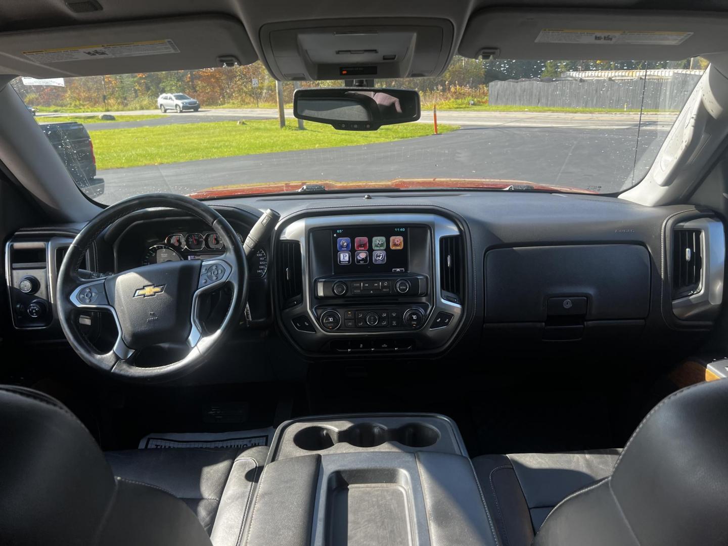 2015 Orange /Black Chevrolet Silverado 1500 LTZ Crew Cab 4WD (3GCUKSEC8FG) with an 5.3L V8 OHV 16V engine, 6-Speed Automatic transmission, located at 11115 Chardon Rd. , Chardon, OH, 44024, (440) 214-9705, 41.580246, -81.241943 - Photo#35