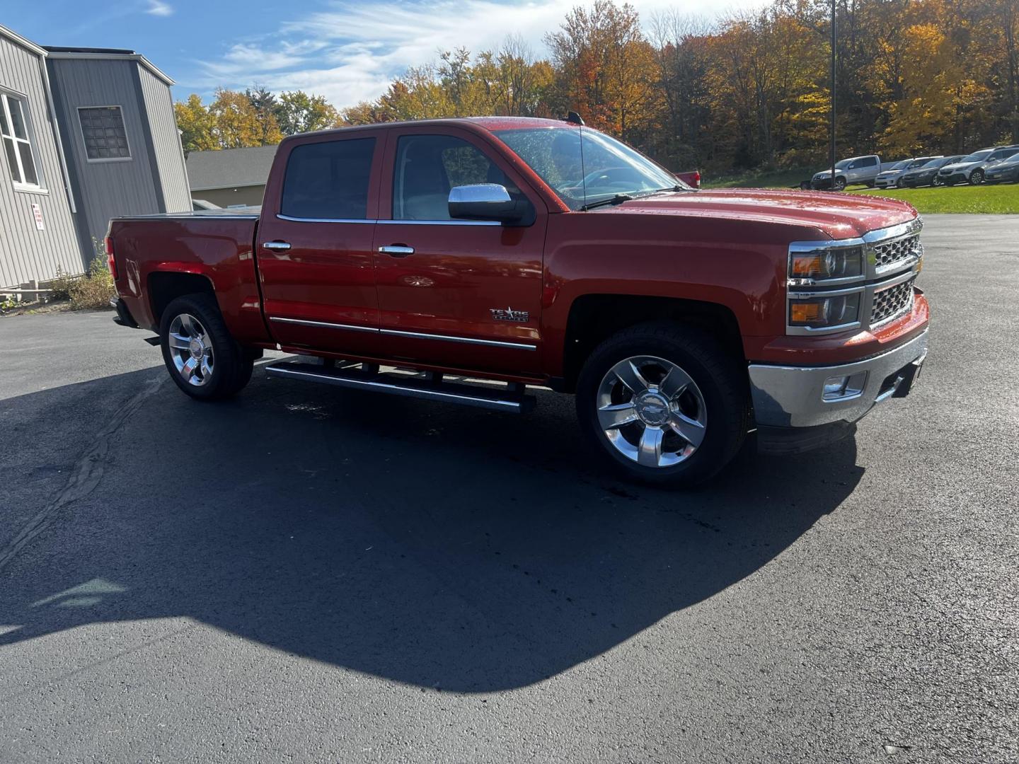 2015 Orange /Black Chevrolet Silverado 1500 LTZ Crew Cab 4WD (3GCUKSEC8FG) with an 5.3L V8 OHV 16V engine, 6-Speed Automatic transmission, located at 11115 Chardon Rd. , Chardon, OH, 44024, (440) 214-9705, 41.580246, -81.241943 - Photo#4