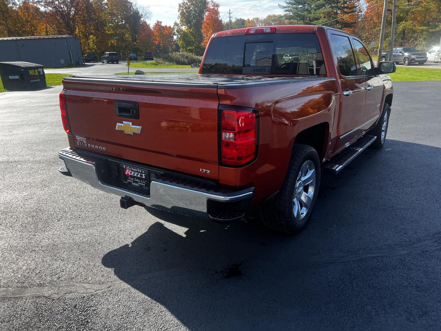 2015 Orange /Black Chevrolet Silverado 1500 LTZ Crew Cab 4WD (3GCUKSEC8FG) with an 5.3L V8 OHV 16V engine, 6-Speed Automatic transmission, located at 11115 Chardon Rd. , Chardon, OH, 44024, (440) 214-9705, 41.580246, -81.241943 - Photo#8