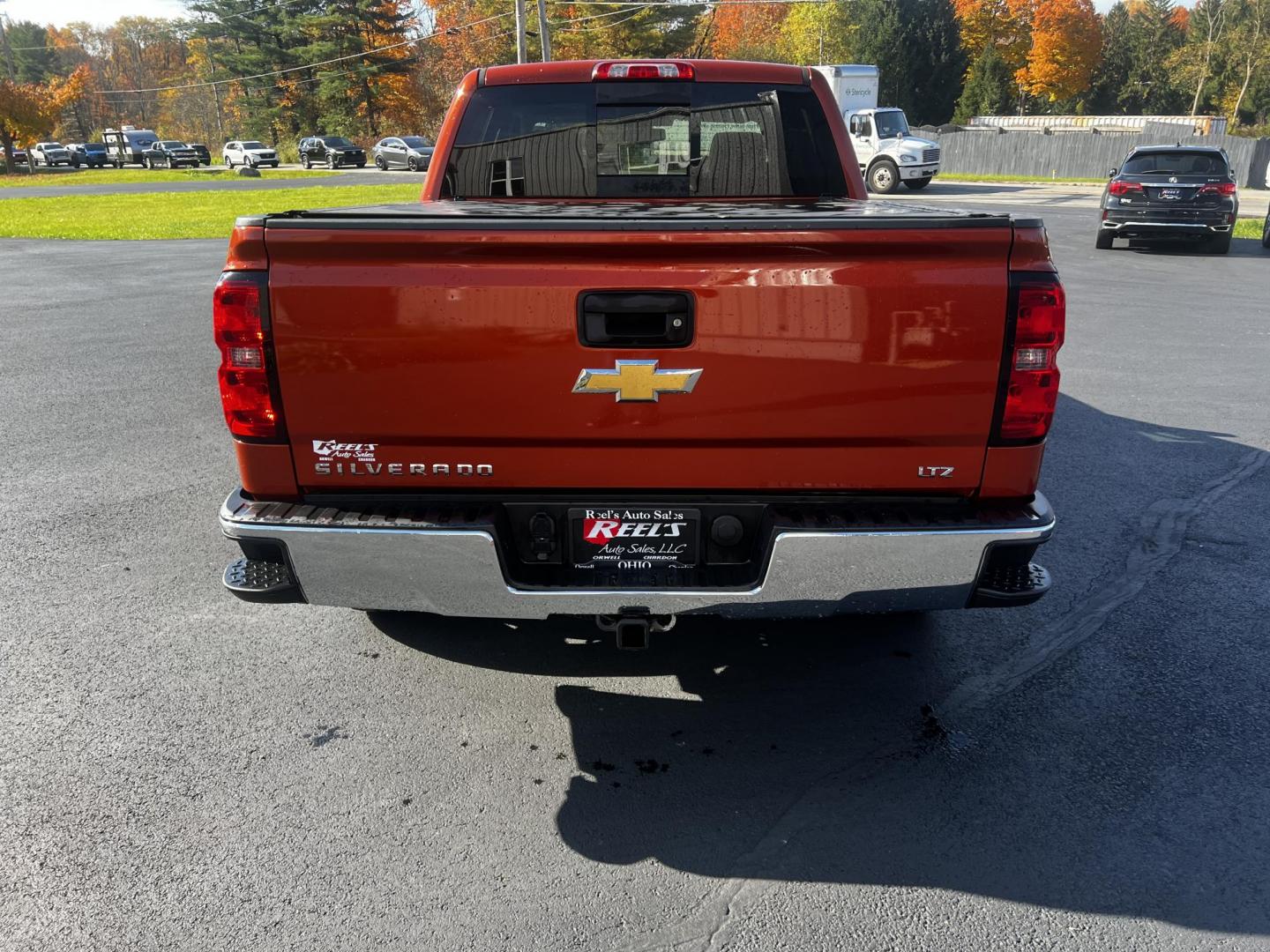 2015 Orange /Black Chevrolet Silverado 1500 LTZ Crew Cab 4WD (3GCUKSEC8FG) with an 5.3L V8 OHV 16V engine, 6-Speed Automatic transmission, located at 11115 Chardon Rd. , Chardon, OH, 44024, (440) 214-9705, 41.580246, -81.241943 - Photo#9