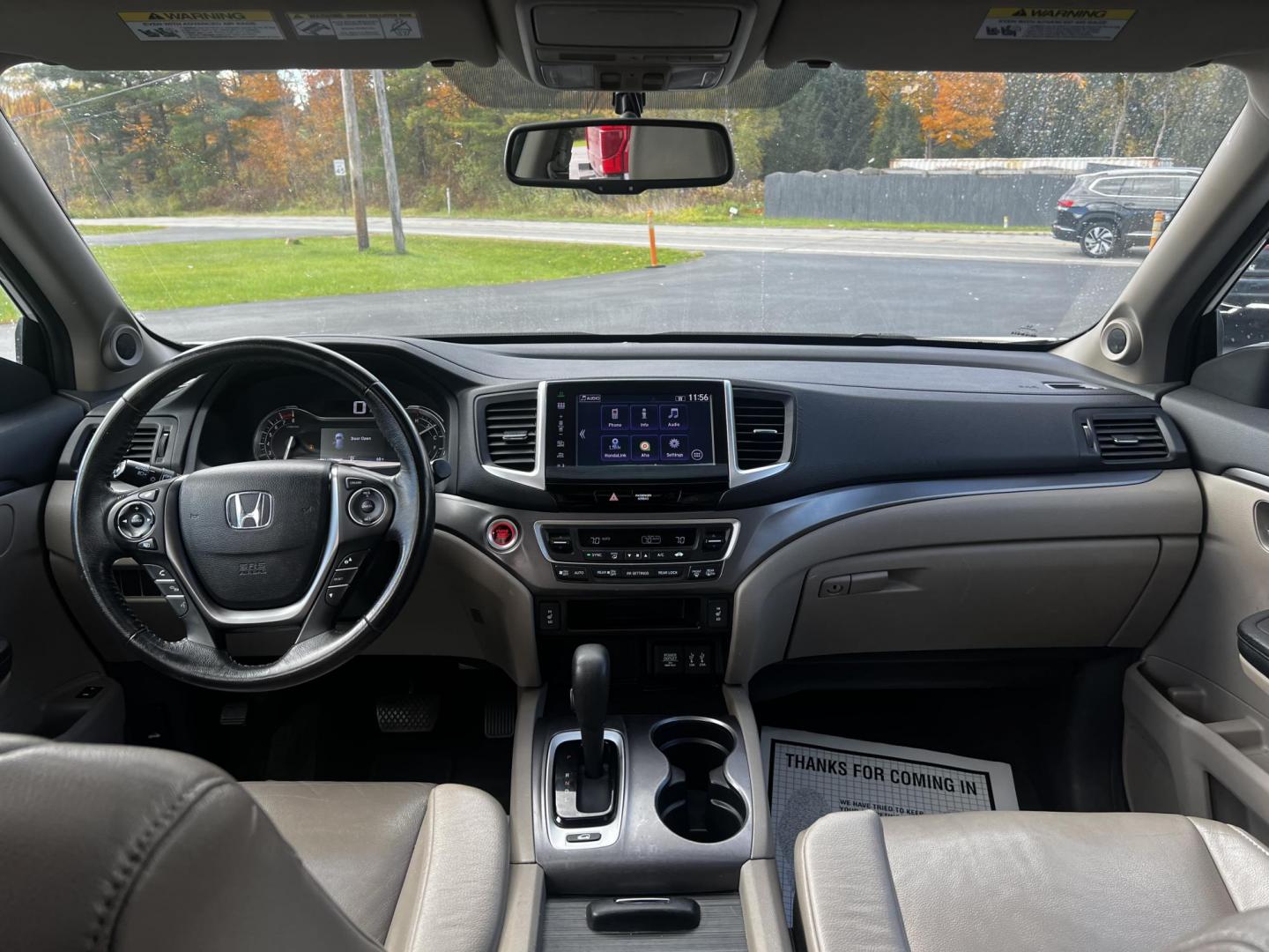 2016 White /Gray Honda Pilot EXL 4WD (5FNYF6H55GB) with an 3.5L V6 SOHC 24V engine, 6-Speed Automatic transmission, located at 11115 Chardon Rd. , Chardon, OH, 44024, (440) 214-9705, 41.580246, -81.241943 - This 2016 Honda Pilot EX-L AWD, equipped with a 3.5L EarthDreams V6 engine and a 6-speed automatic transmission, offers a blend of performance and efficiency, achieving approximately 26 MPG on the highway. It features a comfortable leather interior with heated front seats, an 8.0" touchscreen, and H - Photo#36