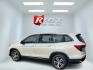 2016 White /Gray Honda Pilot EXL 4WD (5FNYF6H55GB) with an 3.5L V6 SOHC 24V engine, 6-Speed Automatic transmission, located at 11115 Chardon Rd. , Chardon, OH, 44024, (440) 214-9705, 41.580246, -81.241943 - This 2016 Honda Pilot EX-L AWD, equipped with a 3.5L EarthDreams V6 engine and a 6-speed automatic transmission, offers a blend of performance and efficiency, achieving approximately 26 MPG on the highway. It features a comfortable leather interior with heated front seats, an 8.0" touchscreen, and H - Photo#8