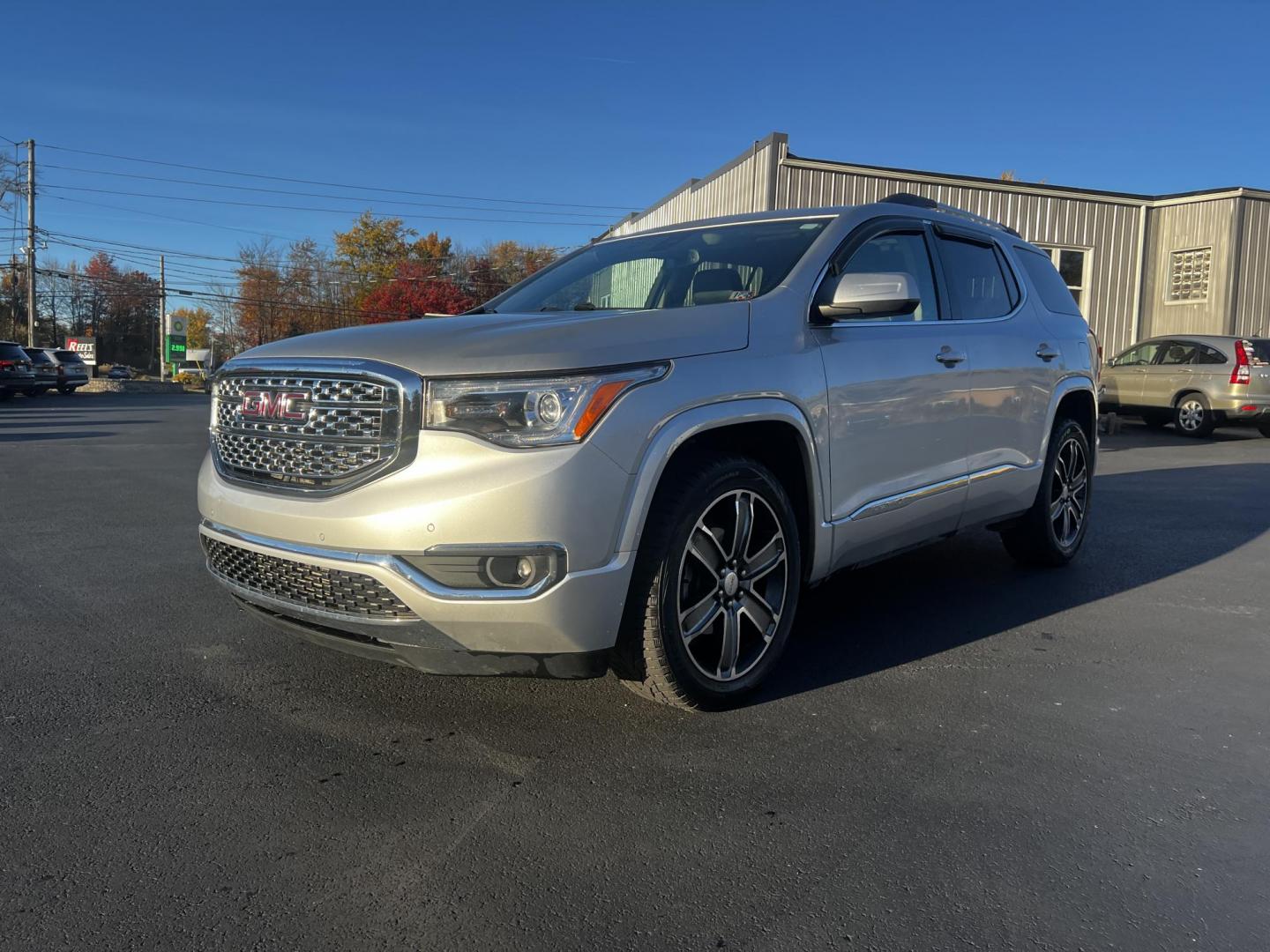 2017 Silver /Black GMC Acadia Denali AWD (1GKKNXLS0HZ) with an 3.6L V6 DOHC 24V engine, 6 Speed Automatic transmission, located at 11115 Chardon Rd. , Chardon, OH, 44024, (440) 214-9705, 41.580246, -81.241943 - This 2017 GMC Acadia Denali AWD is a premium midsize SUV that combines luxury with performance, driven by a 3.6-liter V6 engine paired with a 6-speed automatic transmission. It’s outfitted with HID headlights and power front seats, offering superior visibility and comfort. The interior features tr - Photo#0