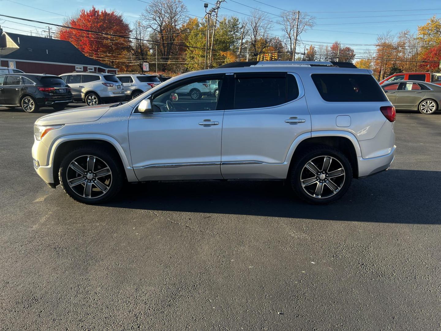 2017 Silver /Black GMC Acadia Denali AWD (1GKKNXLS0HZ) with an 3.6L V6 DOHC 24V engine, 6 Speed Automatic transmission, located at 11115 Chardon Rd. , Chardon, OH, 44024, (440) 214-9705, 41.580246, -81.241943 - This 2017 GMC Acadia Denali AWD is a premium midsize SUV that combines luxury with performance, driven by a 3.6-liter V6 engine paired with a 6-speed automatic transmission. It’s outfitted with HID headlights and power front seats, offering superior visibility and comfort. The interior features tr - Photo#13