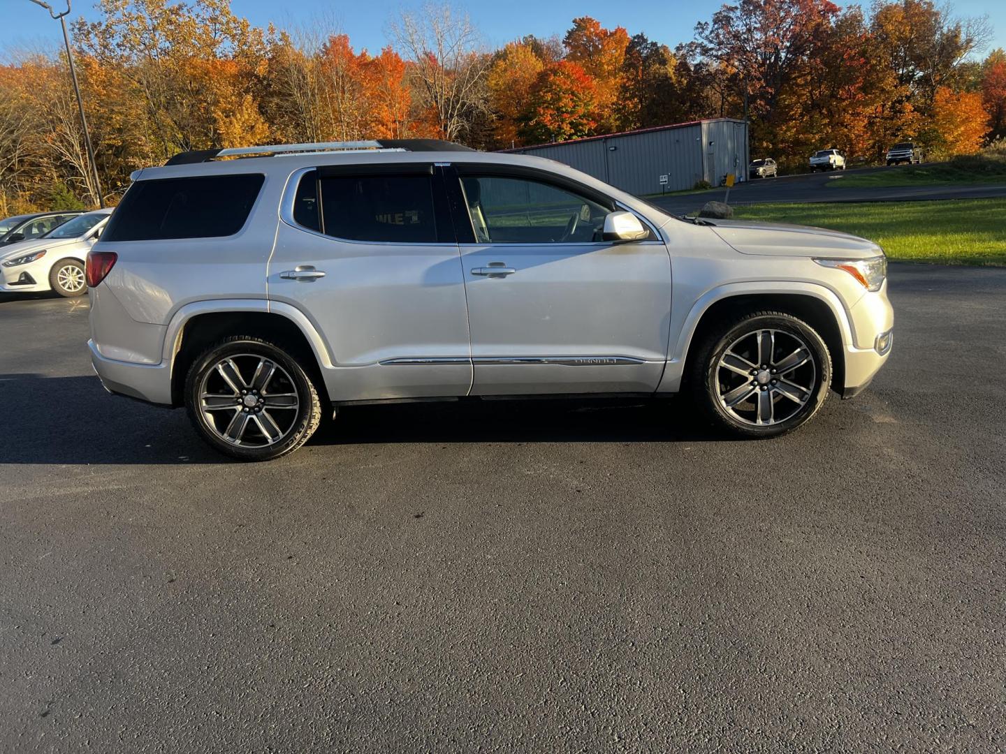 2017 Silver /Black GMC Acadia Denali AWD (1GKKNXLS0HZ) with an 3.6L V6 DOHC 24V engine, 6 Speed Automatic transmission, located at 11115 Chardon Rd. , Chardon, OH, 44024, (440) 214-9705, 41.580246, -81.241943 - This 2017 GMC Acadia Denali AWD is a premium midsize SUV that combines luxury with performance, driven by a 3.6-liter V6 engine paired with a 6-speed automatic transmission. It’s outfitted with HID headlights and power front seats, offering superior visibility and comfort. The interior features tr - Photo#5