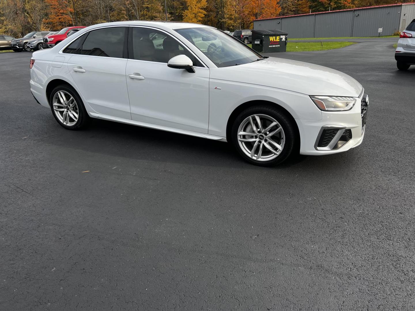 2021 White /Brown Audi A4 Premium Plus quattro (WAUEAAF4XMA) with an 2.0L I4 DOHC 16V TURBO engine, 7A transmission, located at 547 E. Main St., Orwell, OH, 44076, (440) 437-5893, 41.535435, -80.847855 - Photo#4