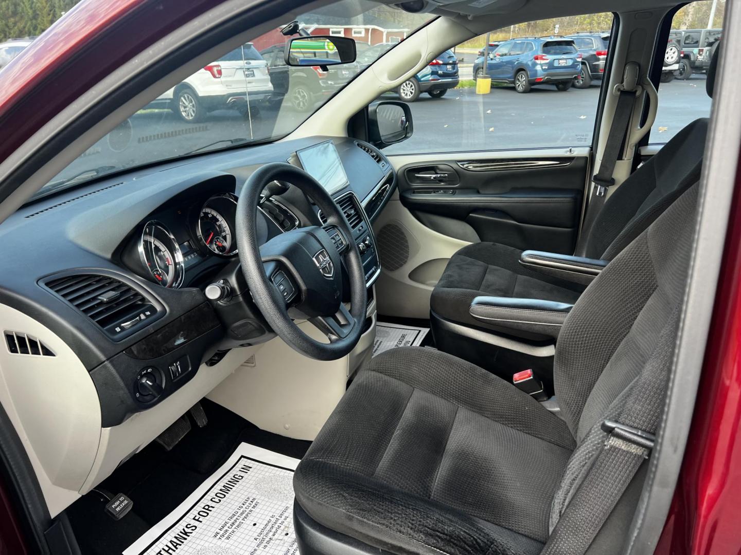 2016 Red /Black Dodge Grand Caravan SE (2C4RDGBG1GR) with an 3.6L V6 DOHC 24V FFV engine, 6A transmission, located at 11115 Chardon Rd. , Chardon, OH, 44024, (440) 214-9705, 41.580246, -81.241943 - Photo#15