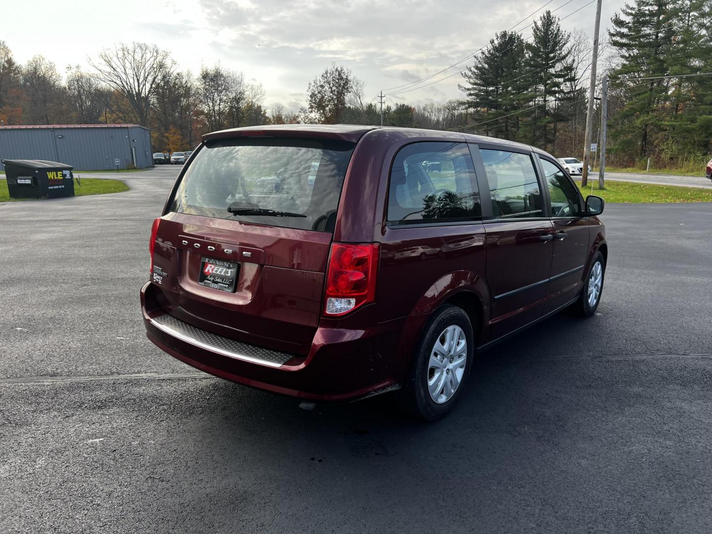 2016 Red /Black Dodge Grand Caravan SE (2C4RDGBG1GR) with an 3.6L V6 DOHC 24V FFV engine, 6A transmission, located at 11115 Chardon Rd. , Chardon, OH, 44024, (440) 214-9705, 41.580246, -81.241943 - Photo#7