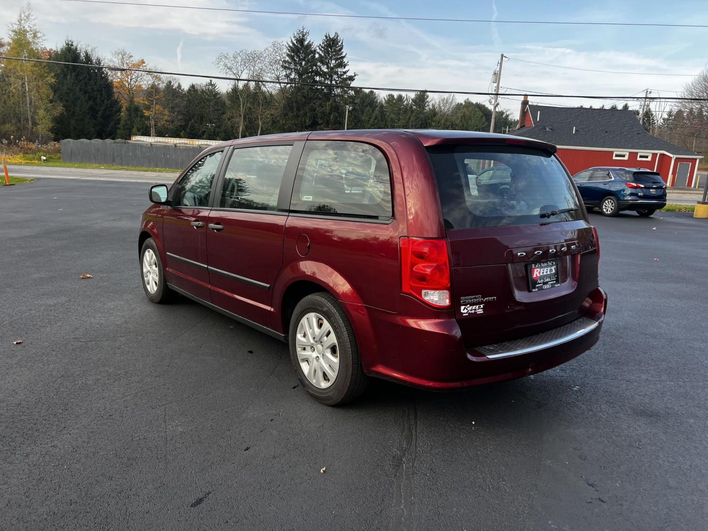 2016 Red /Black Dodge Grand Caravan SE (2C4RDGBG1GR) with an 3.6L V6 DOHC 24V FFV engine, 6A transmission, located at 11115 Chardon Rd. , Chardon, OH, 44024, (440) 214-9705, 41.580246, -81.241943 - Photo#9