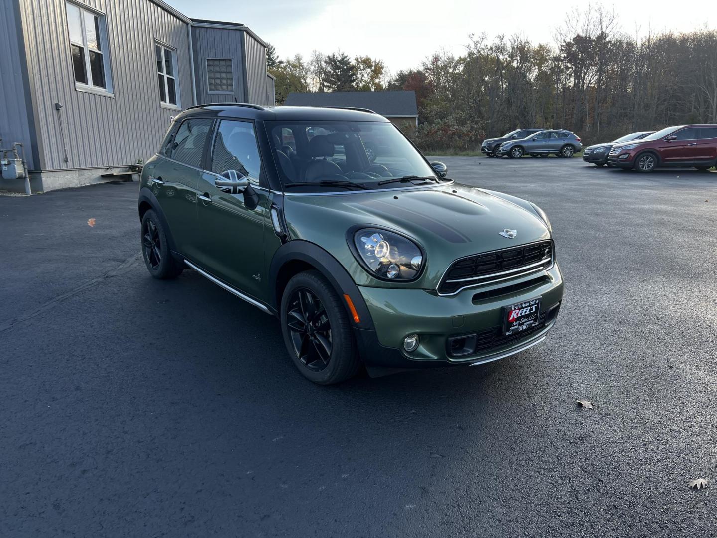 2016 Green /Black Mini Countryman S ALL4 (WMWZC5C5XGW) with an 1.6L I4 DOHC 16V TURBO engine, 8-Speed Automatic transmission, located at 11115 Chardon Rd. , Chardon, OH, 44024, (440) 214-9705, 41.580246, -81.241943 - Photo#1