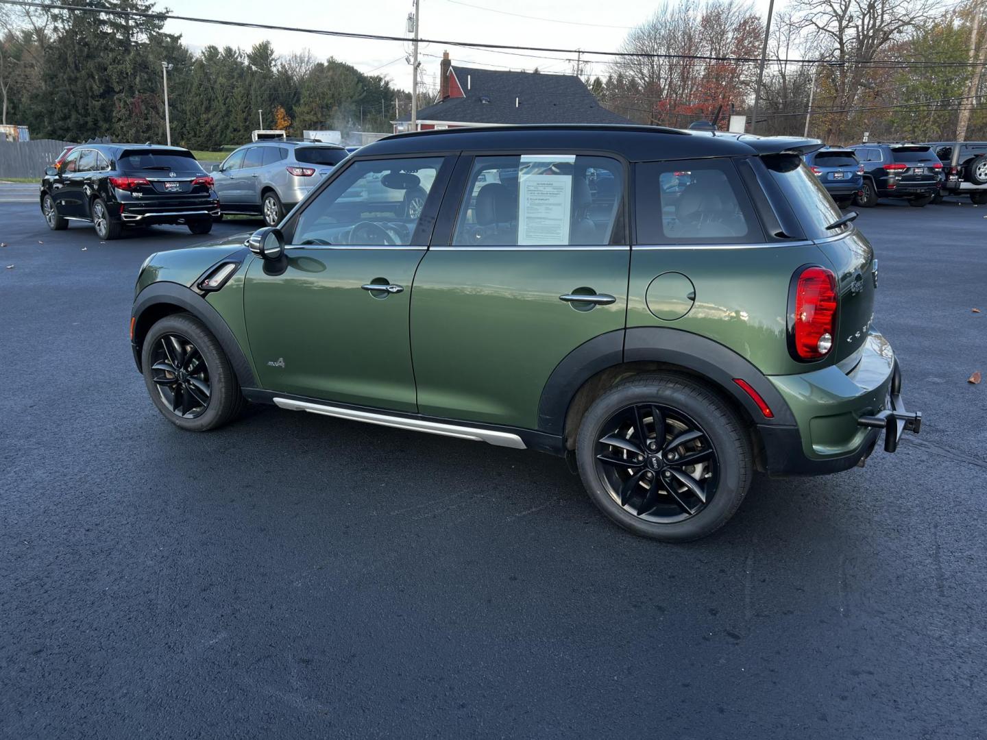 2016 Green /Black Mini Countryman S ALL4 (WMWZC5C5XGW) with an 1.6L I4 DOHC 16V TURBO engine, 8-Speed Automatic transmission, located at 11115 Chardon Rd. , Chardon, OH, 44024, (440) 214-9705, 41.580246, -81.241943 - Photo#11