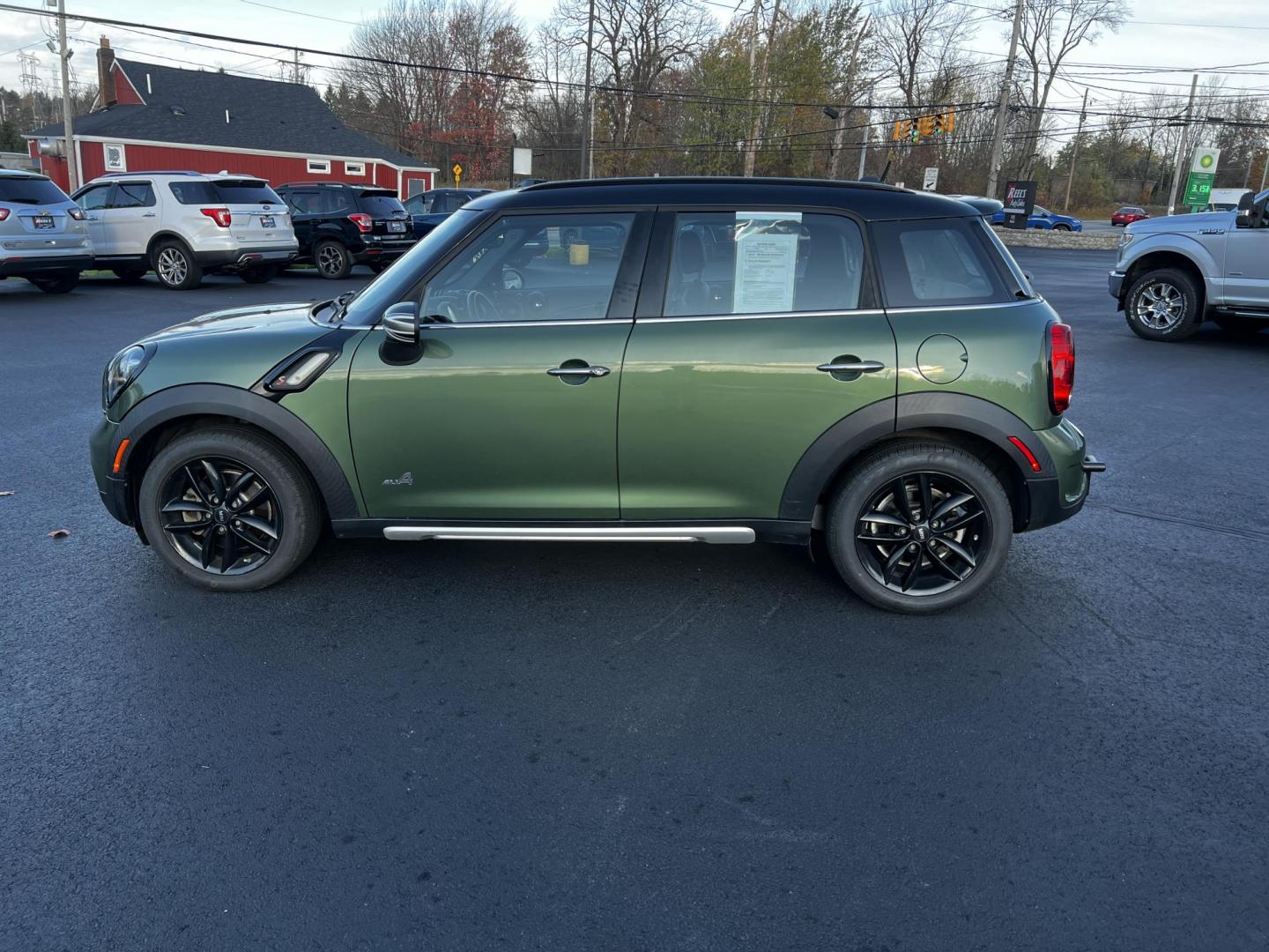 2016 Green /Black Mini Countryman S ALL4 (WMWZC5C5XGW) with an 1.6L I4 DOHC 16V TURBO engine, 8-Speed Automatic transmission, located at 11115 Chardon Rd. , Chardon, OH, 44024, (440) 214-9705, 41.580246, -81.241943 - Photo#13