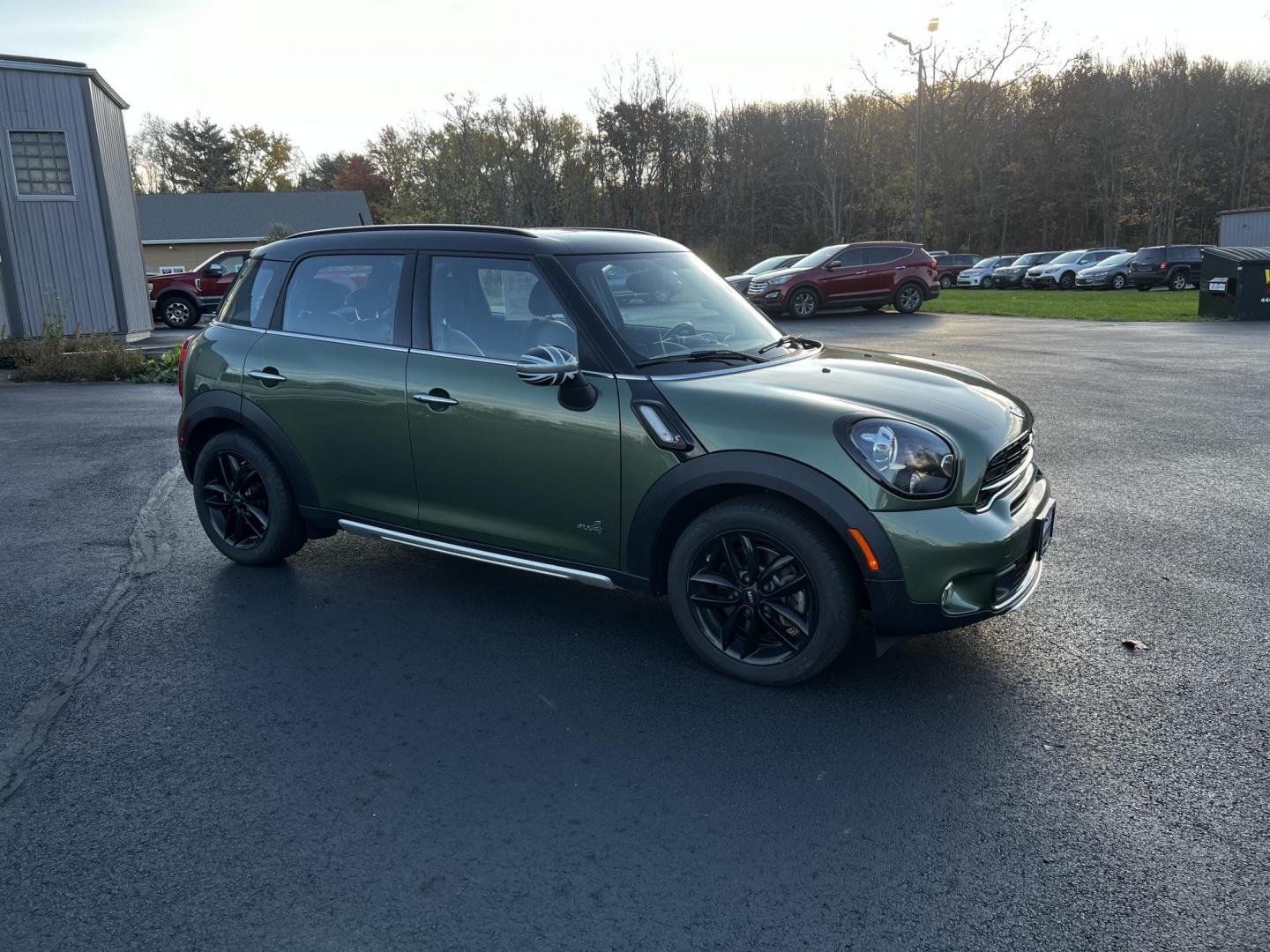 2016 Green /Black Mini Countryman S ALL4 (WMWZC5C5XGW) with an 1.6L I4 DOHC 16V TURBO engine, 8-Speed Automatic transmission, located at 11115 Chardon Rd. , Chardon, OH, 44024, (440) 214-9705, 41.580246, -81.241943 - Photo#4