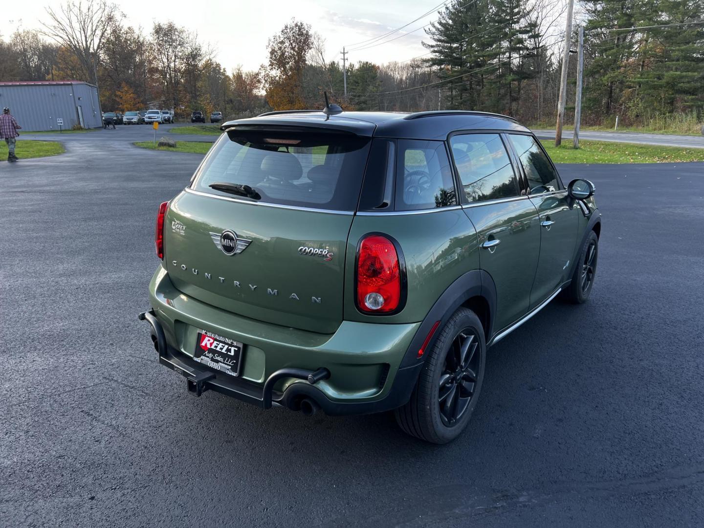 2016 Green /Black Mini Countryman S ALL4 (WMWZC5C5XGW) with an 1.6L I4 DOHC 16V TURBO engine, 8-Speed Automatic transmission, located at 11115 Chardon Rd. , Chardon, OH, 44024, (440) 214-9705, 41.580246, -81.241943 - Photo#7