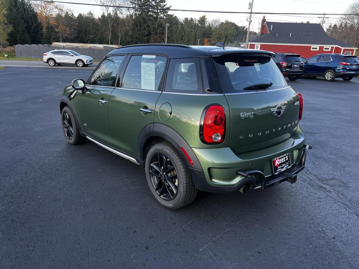 2016 Green /Black Mini Countryman S ALL4 (WMWZC5C5XGW) with an 1.6L I4 DOHC 16V TURBO engine, 8-Speed Automatic transmission, located at 11115 Chardon Rd. , Chardon, OH, 44024, (440) 214-9705, 41.580246, -81.241943 - Photo#9