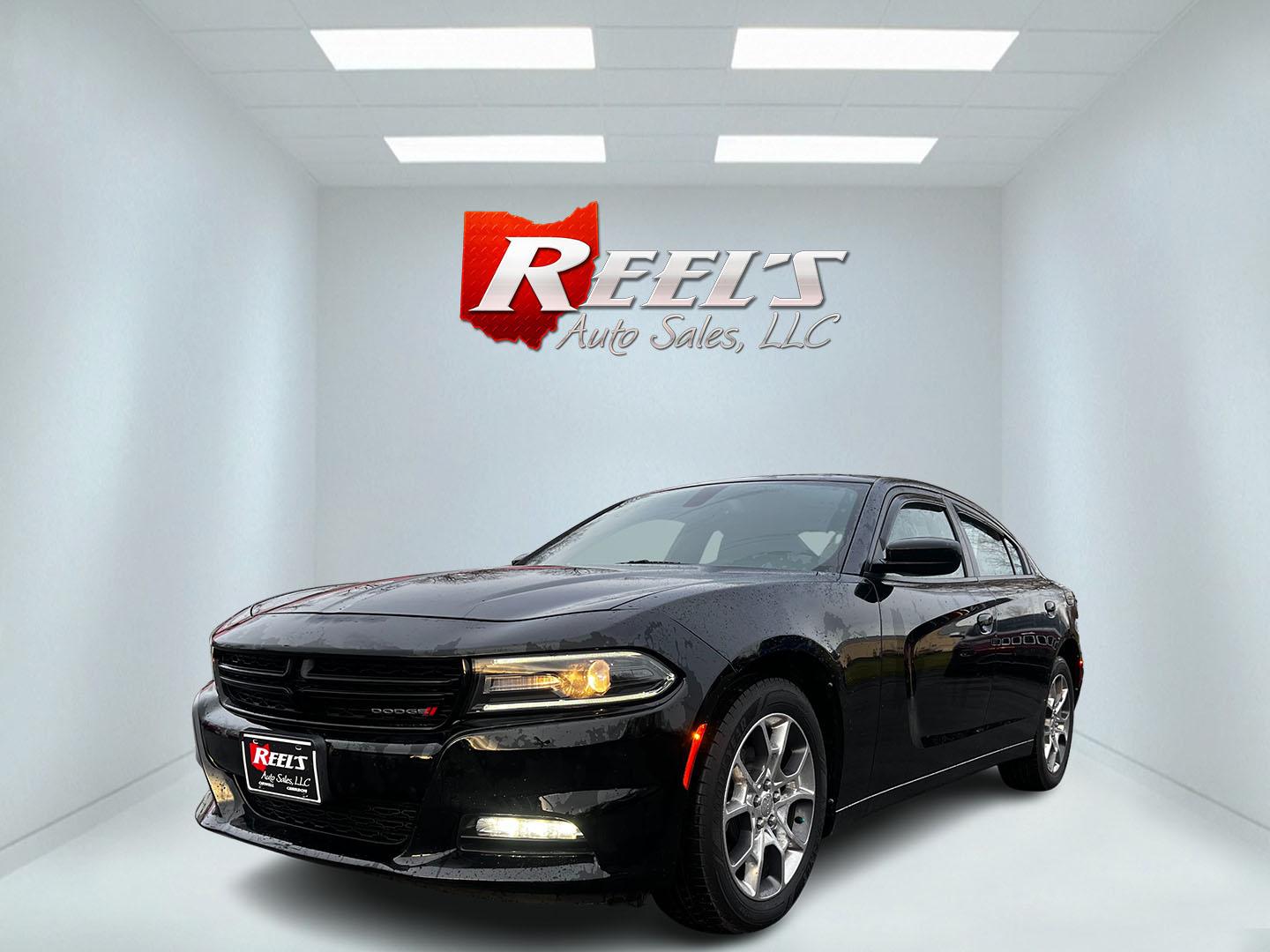 2016 Black /Black Dodge Charger SXT Rallye AWD (2C3CDXJG2GH) with an 3.6L V6 DOHC 24V engine, 8A transmission, located at 547 E. Main St., Orwell, OH, 44076, (440) 437-5893, 41.535435, -80.847855 - Photo#0