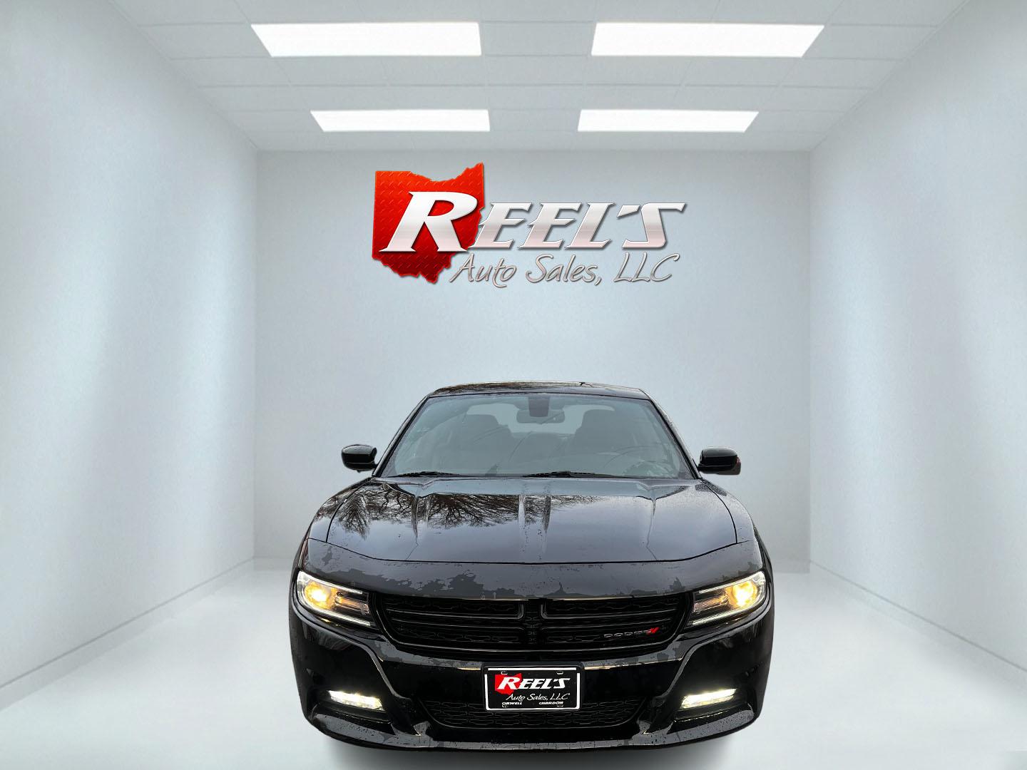 2016 Black /Black Dodge Charger SXT Rallye AWD (2C3CDXJG2GH) with an 3.6L V6 DOHC 24V engine, 8A transmission, located at 547 E. Main St., Orwell, OH, 44076, (440) 437-5893, 41.535435, -80.847855 - Photo#1