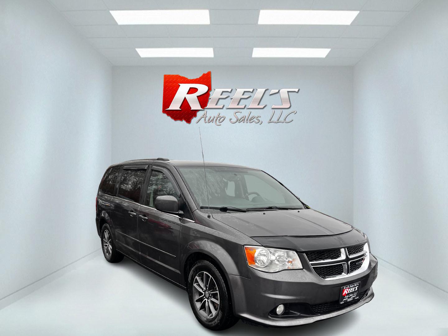 2017 Gray /Black Dodge Grand Caravan SXT (2C4RDGCG0HR) with an 3.6L V6 DOHC 24V FFV engine, 6A transmission, located at 547 E. Main St., Orwell, OH, 44076, (440) 437-5893, 41.535435, -80.847855 - This 2017 Dodge Grand Caravan SXT offers a blend of versatility and comfort, making it a strong contender for families needing ample space and convenience. It is equipped with a 3.6-liter Pentastar V6 engine paired with a 6-speed automatic transmission, providing robust performance along with flex-f - Photo#2