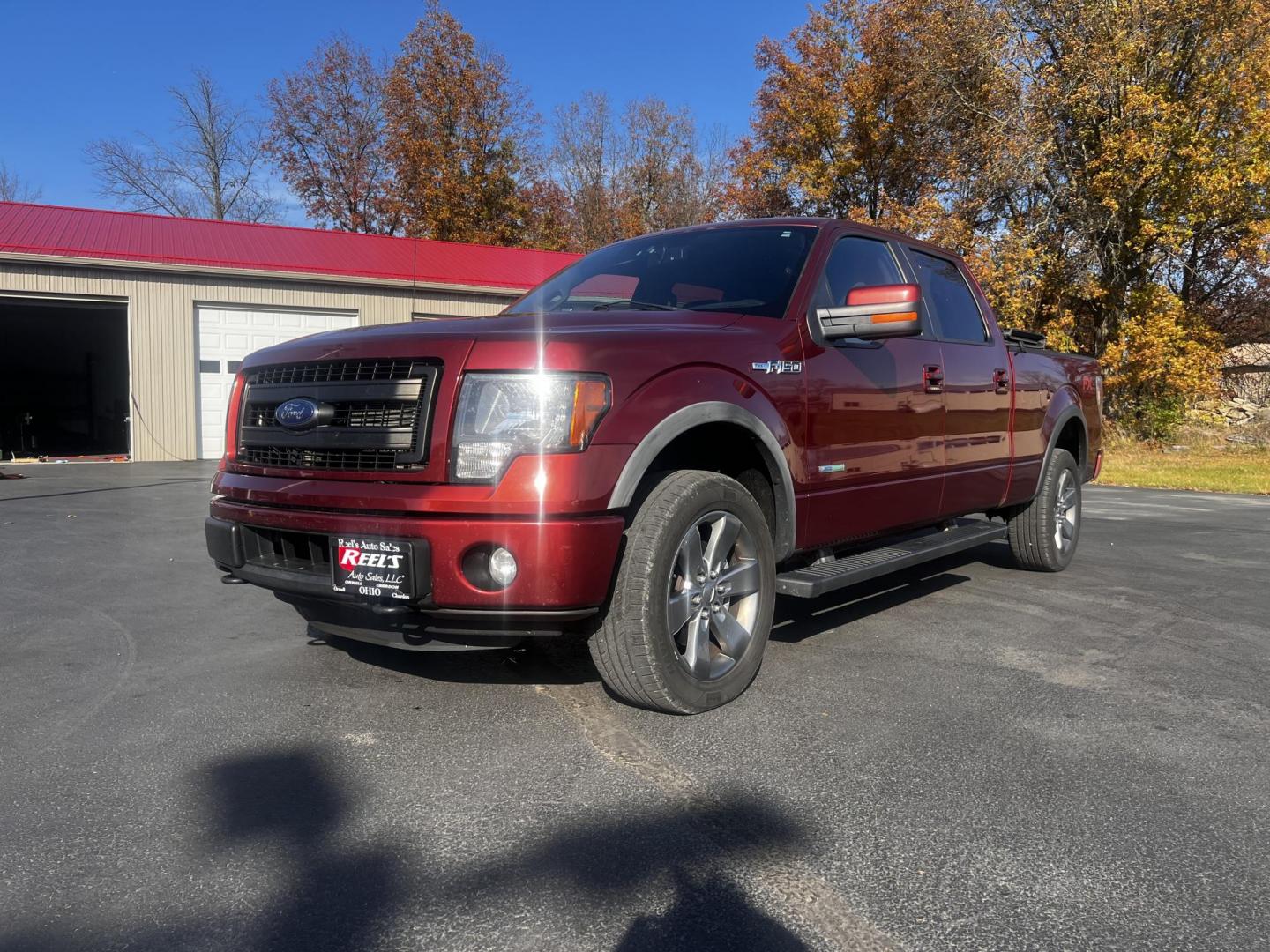 2014 Orange /Black Ford F-150 FX4 SuperCrew 6.5-ft. Bed 4WD (1FTFW1ET7EK) with an 3.5L V6 DOHC 24V TWIN TURBO engine, 6-Speed Automatic transmission, located at 547 E. Main St., Orwell, OH, 44076, (440) 437-5893, 41.535435, -80.847855 - Photo#0