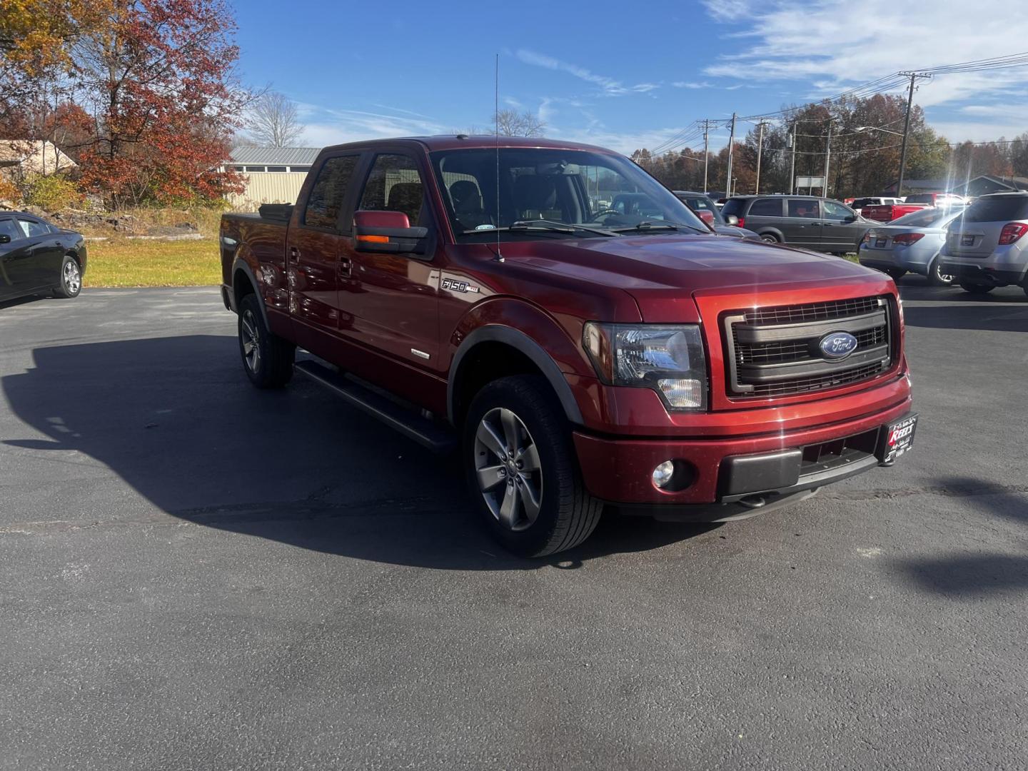 2014 Orange /Black Ford F-150 FX4 SuperCrew 6.5-ft. Bed 4WD (1FTFW1ET7EK) with an 3.5L V6 DOHC 24V TWIN TURBO engine, 6-Speed Automatic transmission, located at 547 E. Main St., Orwell, OH, 44076, (440) 437-5893, 41.535435, -80.847855 - Photo#1