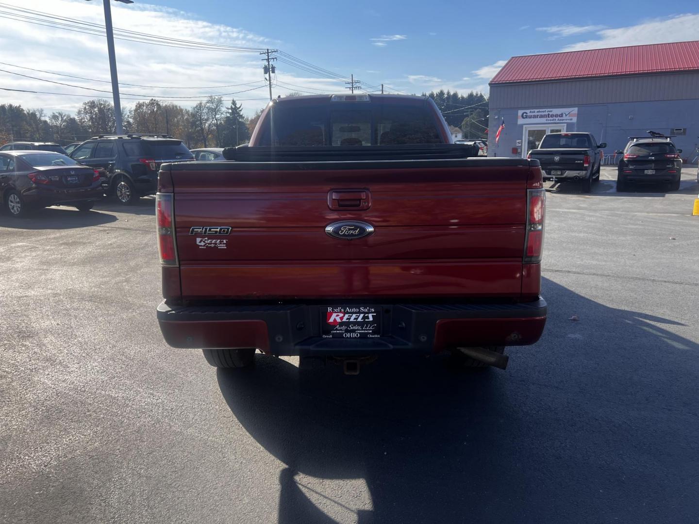 2014 Orange /Black Ford F-150 FX4 SuperCrew 6.5-ft. Bed 4WD (1FTFW1ET7EK) with an 3.5L V6 DOHC 24V TWIN TURBO engine, 6-Speed Automatic transmission, located at 547 E. Main St., Orwell, OH, 44076, (440) 437-5893, 41.535435, -80.847855 - Photo#10