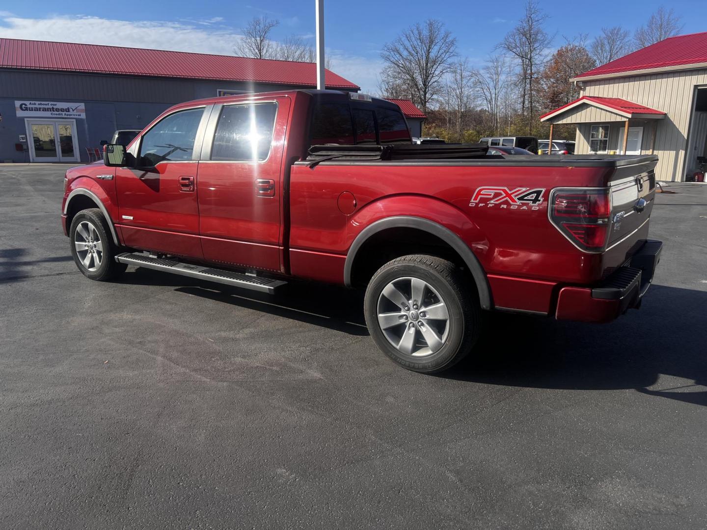 2014 Orange /Black Ford F-150 FX4 SuperCrew 6.5-ft. Bed 4WD (1FTFW1ET7EK) with an 3.5L V6 DOHC 24V TWIN TURBO engine, 6-Speed Automatic transmission, located at 547 E. Main St., Orwell, OH, 44076, (440) 437-5893, 41.535435, -80.847855 - Photo#11