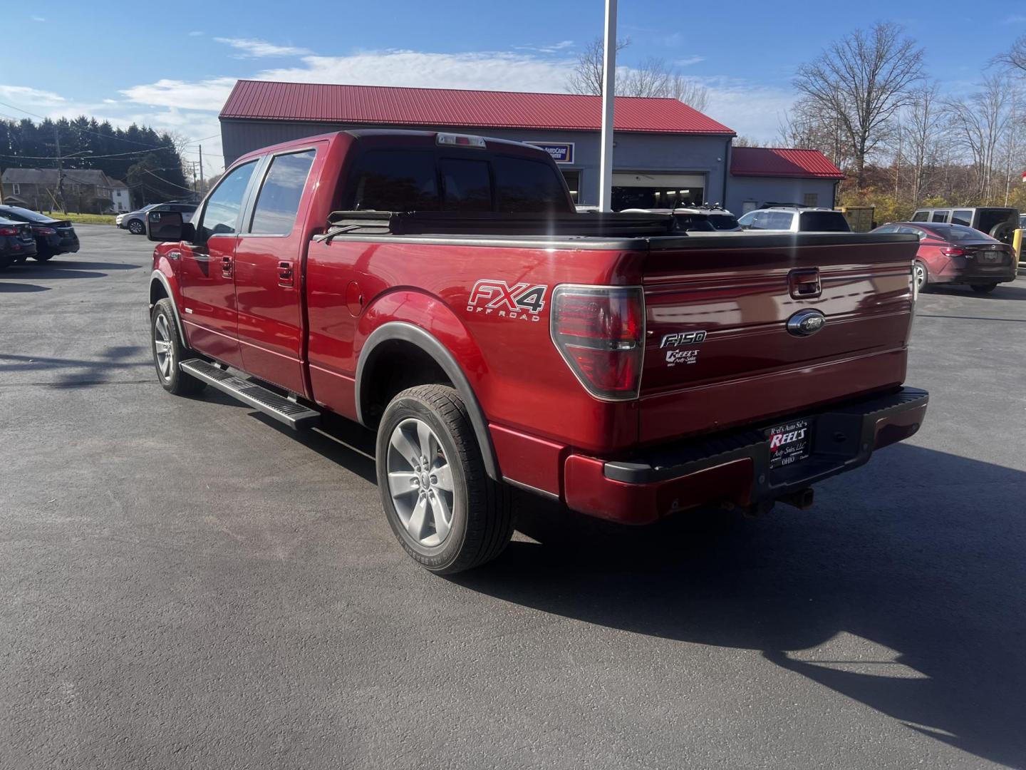 2014 Orange /Black Ford F-150 FX4 SuperCrew 6.5-ft. Bed 4WD (1FTFW1ET7EK) with an 3.5L V6 DOHC 24V TWIN TURBO engine, 6-Speed Automatic transmission, located at 547 E. Main St., Orwell, OH, 44076, (440) 437-5893, 41.535435, -80.847855 - Photo#12