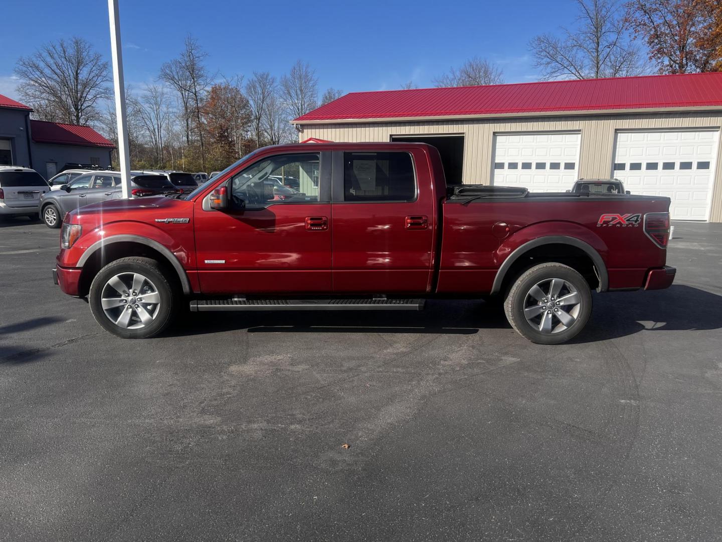 2014 Orange /Black Ford F-150 FX4 SuperCrew 6.5-ft. Bed 4WD (1FTFW1ET7EK) with an 3.5L V6 DOHC 24V TWIN TURBO engine, 6-Speed Automatic transmission, located at 547 E. Main St., Orwell, OH, 44076, (440) 437-5893, 41.535435, -80.847855 - Photo#14