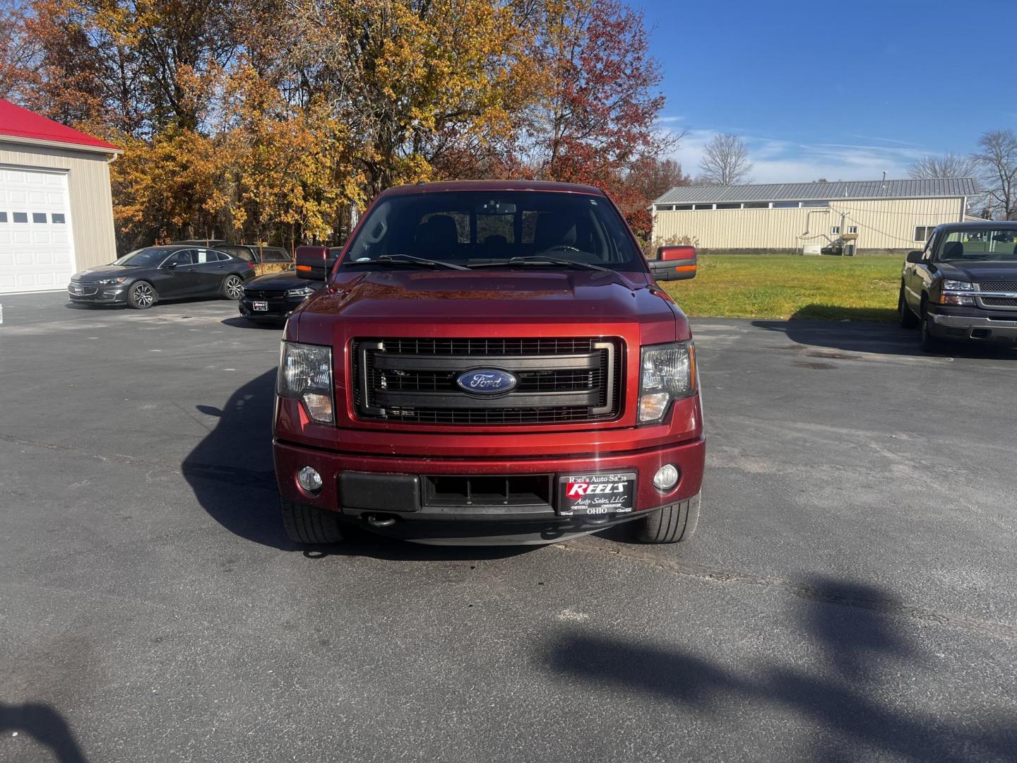 2014 Orange /Black Ford F-150 FX4 SuperCrew 6.5-ft. Bed 4WD (1FTFW1ET7EK) with an 3.5L V6 DOHC 24V TWIN TURBO engine, 6-Speed Automatic transmission, located at 547 E. Main St., Orwell, OH, 44076, (440) 437-5893, 41.535435, -80.847855 - Photo#2