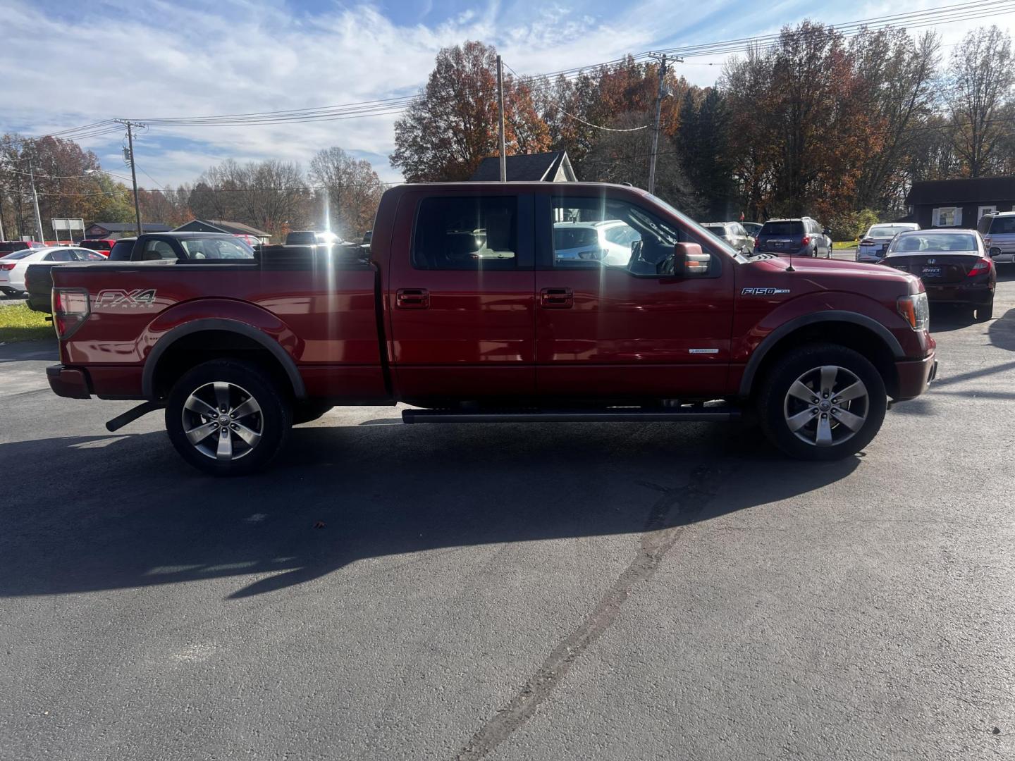 2014 Orange /Black Ford F-150 FX4 SuperCrew 6.5-ft. Bed 4WD (1FTFW1ET7EK) with an 3.5L V6 DOHC 24V TWIN TURBO engine, 6-Speed Automatic transmission, located at 547 E. Main St., Orwell, OH, 44076, (440) 437-5893, 41.535435, -80.847855 - Photo#8