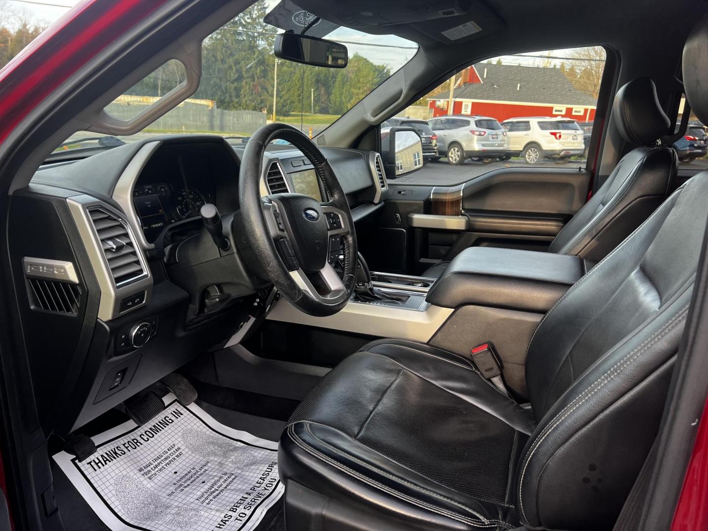 2016 Red /Black Ford F-150 Lariat SuperCrew 5.5-ft. Bed 4WD (1FTEW1EF0GF) with an 5.0L V8 engine, 6A transmission, located at 11115 Chardon Rd. , Chardon, OH, 44024, (440) 214-9705, 41.580246, -81.241943 - This 2016 Ford F-150 Lariat Crew Cab is a robust and versatile pickup equipped with the powerful 5.0 Coyote V8 engine paired with a 6-speed automatic transmission, generating 385 horsepower and 387 lb-ft of torque. Noteworthy for its comfortable leather interior, it features dual-zone automatic clim - Photo#15