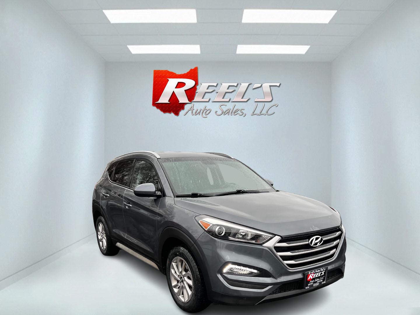 2017 Gray /Black Hyundai Tucson SE w/Popular Package AWD (KM8J3CA43HU) with an 2.0L I4 DOHC 16V engine, 6 Speed Auto transmission, located at 547 E. Main St., Orwell, OH, 44076, (440) 437-5893, 41.535435, -80.847855 - Photo#2