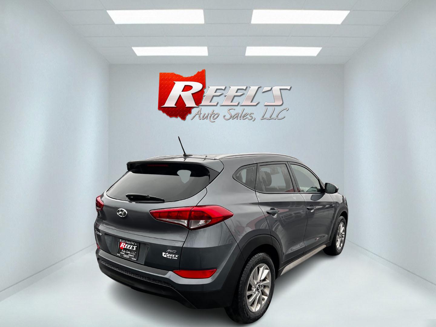 2017 Gray /Black Hyundai Tucson SE w/Popular Package AWD (KM8J3CA43HU) with an 2.0L I4 DOHC 16V engine, 6 Speed Auto transmission, located at 547 E. Main St., Orwell, OH, 44076, (440) 437-5893, 41.535435, -80.847855 - Photo#5