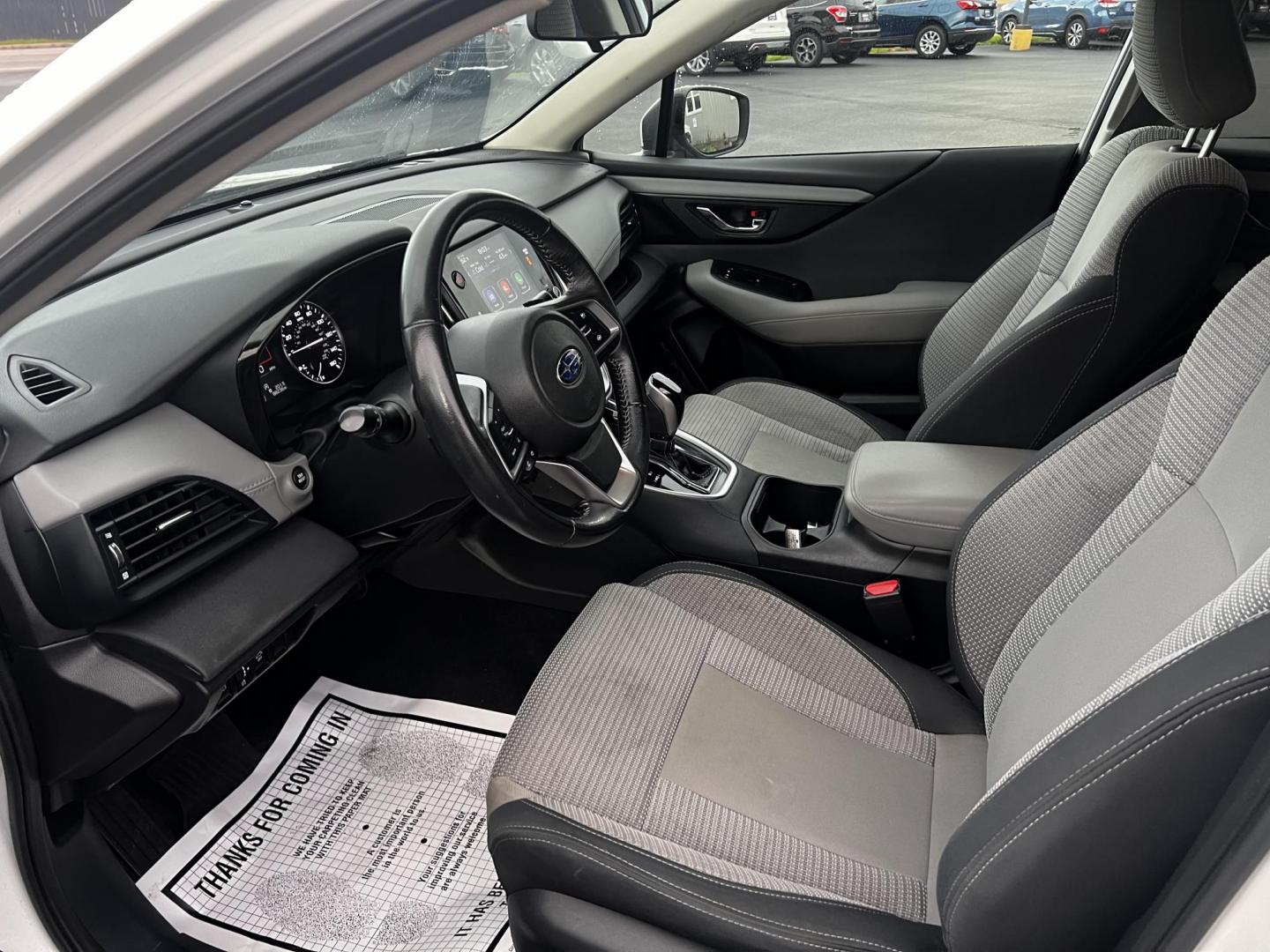 2022 White /Gray Subaru Outback Premium (4S4BTADC0N3) with an 2.5L H4 DOHC 16V engine, Automatic transmission, located at 11115 Chardon Rd. , Chardon, OH, 44024, (440) 214-9705, 41.580246, -81.241943 - This 2022 Subaru Outback Premium is a well-rounded SUV with a focus on comfort, technology, and safety. It features a 2.5L H4 engine with the brand's signature Symmetrical All-Wheel Drive, providing excellent traction and stability. With a highway fuel efficiency of 33 MPG, it balances performance w - Photo#24