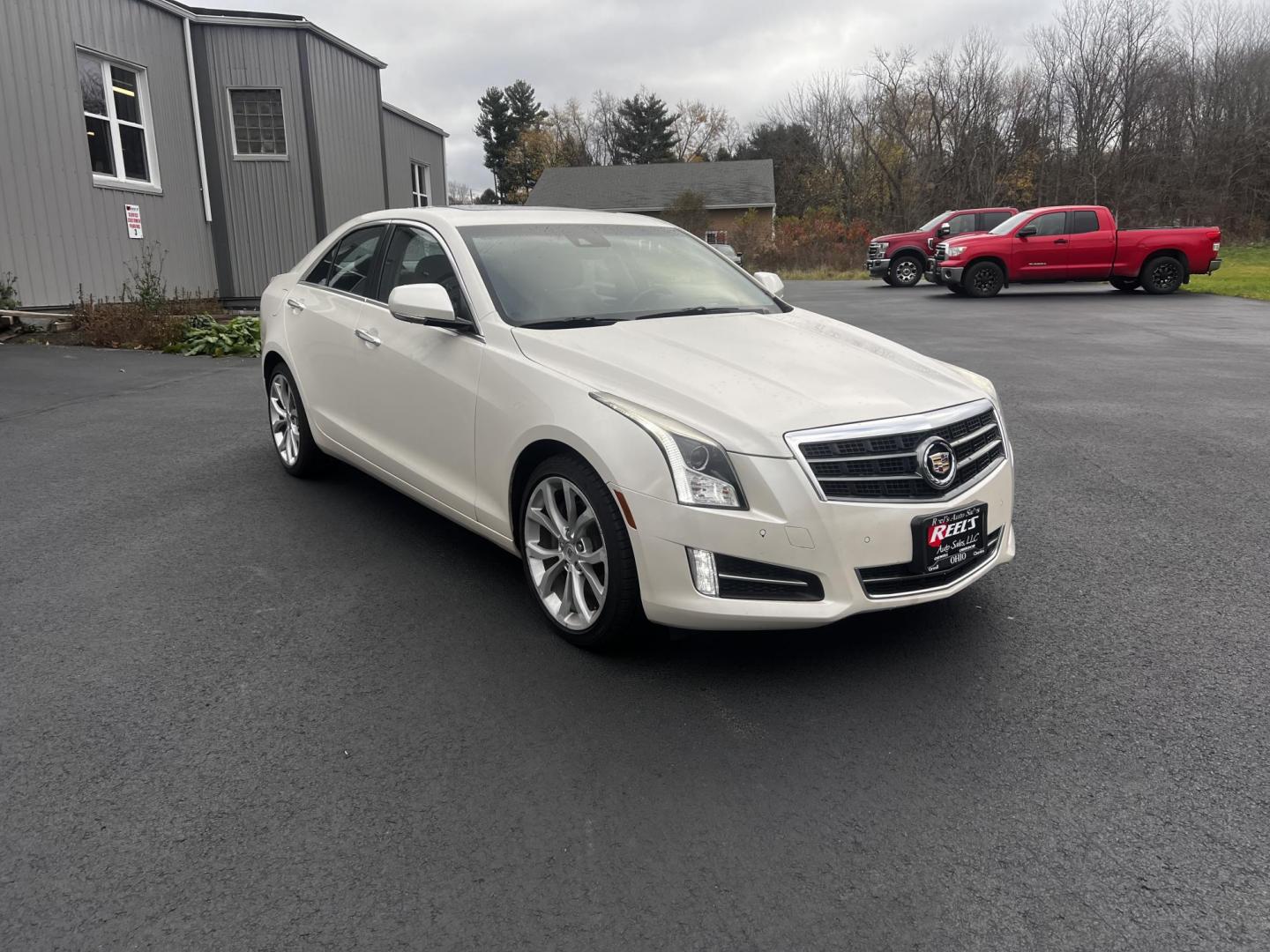 2014 White /Black Cadillac ATS 3.6L Premium AWD (1G6AL5S31E0) with an 3.6L V6 DOHC 24V engine, 6-Speed Automatic transmission, located at 11115 Chardon Rd. , Chardon, OH, 44024, (440) 214-9705, 41.580246, -81.241943 - This 2014 Cadillac ATS Premium V6 AWD is a luxury sedan that combines performance and comfort features. It comes with a robust 3.6-liter V6 engine producing 321 horsepower and is paired with a 6-speed automatic transmission, allowing for a brisk 0-60 mph time of 5.4 seconds. The interior is well-app - Photo#2