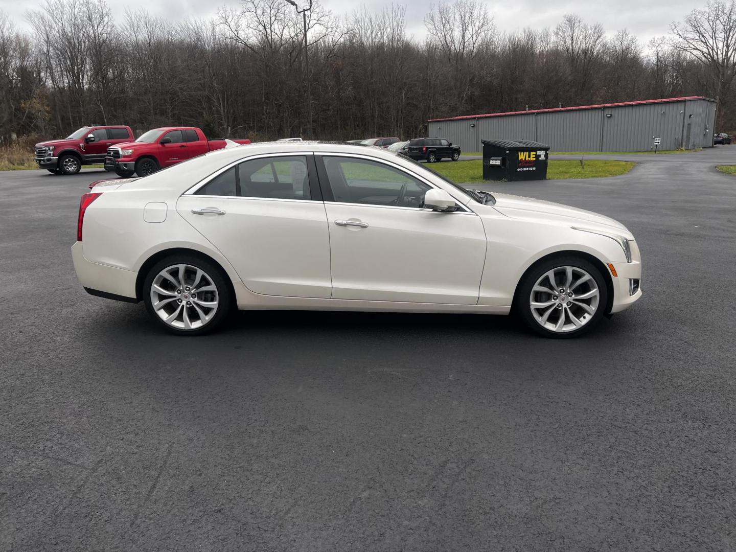 2014 White /Black Cadillac ATS 3.6L Premium AWD (1G6AL5S31E0) with an 3.6L V6 DOHC 24V engine, 6-Speed Automatic transmission, located at 11115 Chardon Rd. , Chardon, OH, 44024, (440) 214-9705, 41.580246, -81.241943 - This 2014 Cadillac ATS Premium V6 AWD is a luxury sedan that combines performance and comfort features. It comes with a robust 3.6-liter V6 engine producing 321 horsepower and is paired with a 6-speed automatic transmission, allowing for a brisk 0-60 mph time of 5.4 seconds. The interior is well-app - Photo#6