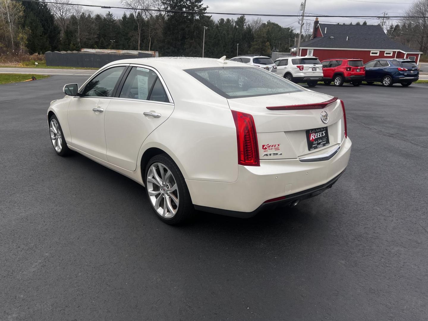 2014 White /Black Cadillac ATS 3.6L Premium AWD (1G6AL5S31E0) with an 3.6L V6 DOHC 24V engine, 6-Speed Automatic transmission, located at 11115 Chardon Rd. , Chardon, OH, 44024, (440) 214-9705, 41.580246, -81.241943 - This 2014 Cadillac ATS Premium V6 AWD is a luxury sedan that combines performance and comfort features. It comes with a robust 3.6-liter V6 engine producing 321 horsepower and is paired with a 6-speed automatic transmission, allowing for a brisk 0-60 mph time of 5.4 seconds. The interior is well-app - Photo#8