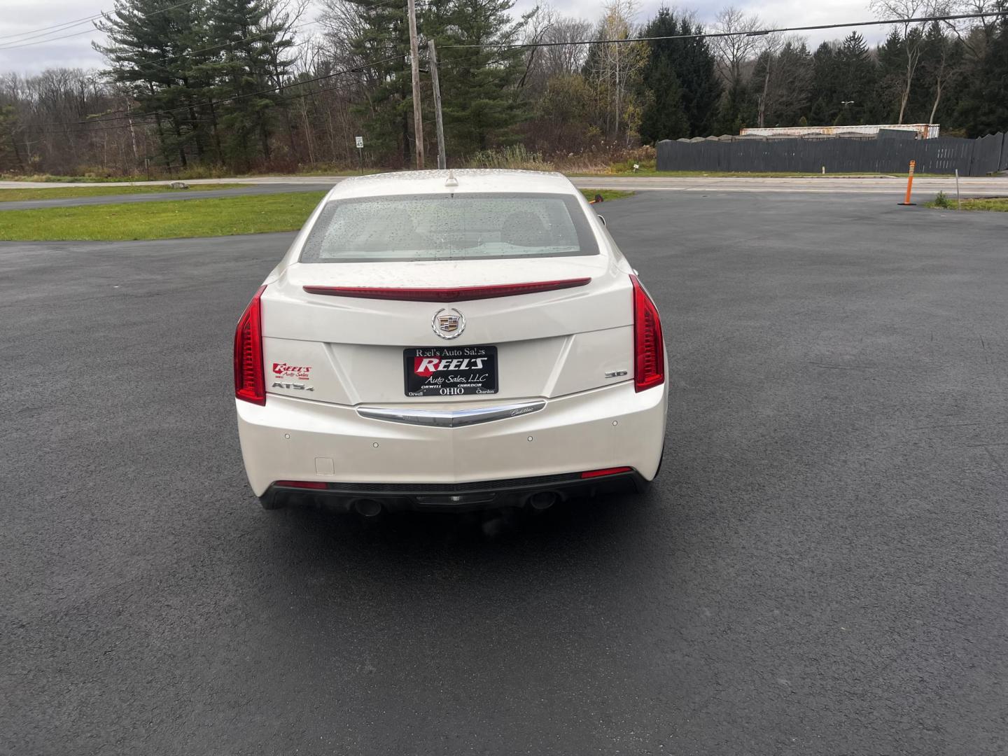 2014 White /Black Cadillac ATS 3.6L Premium AWD (1G6AL5S31E0) with an 3.6L V6 DOHC 24V engine, 6-Speed Automatic transmission, located at 11115 Chardon Rd. , Chardon, OH, 44024, (440) 214-9705, 41.580246, -81.241943 - This 2014 Cadillac ATS Premium V6 AWD is a luxury sedan that combines performance and comfort features. It comes with a robust 3.6-liter V6 engine producing 321 horsepower and is paired with a 6-speed automatic transmission, allowing for a brisk 0-60 mph time of 5.4 seconds. The interior is well-app - Photo#9