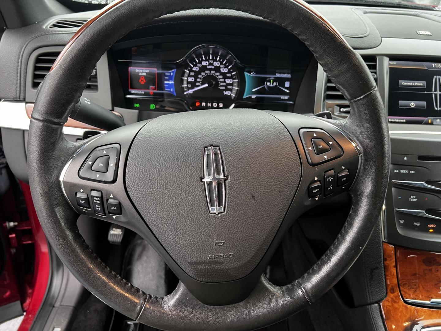 2015 Red /Black Lincoln MKS EcoBoost AWD (1LNHL9FT0FG) with an 3.5L V6 DOHC 24V engine, 6A transmission, located at 11115 Chardon Rd. , Chardon, OH, 44024, (440) 214-9705, 41.580246, -81.241943 - Photo#7