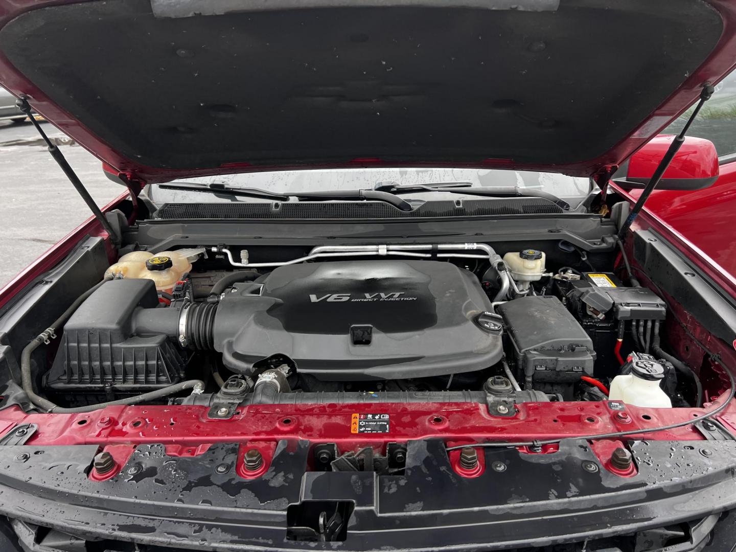 2017 Red /Black Chevrolet Colorado Z71 Crew Cab 4WD Short Box (1GCGTDEN9H1) with an 3.6L V6 DOHC 24V GAS engine, 8-Speed Automatic transmission, located at 547 E. Main St., Orwell, OH, 44076, (440) 437-5893, 41.535435, -80.847855 - This 2017 Chevrolet Colorado Z71 Crew Cab 4WD is equipped with a 3.6-liter V6 engine paired with a 8-speed automatic transmission, providing a towing capacity of 7,600 pounds, making it practical for both everyday use and heavier towing tasks. Offering up to 24 MPG on the highway, it balances perfor - Photo#15