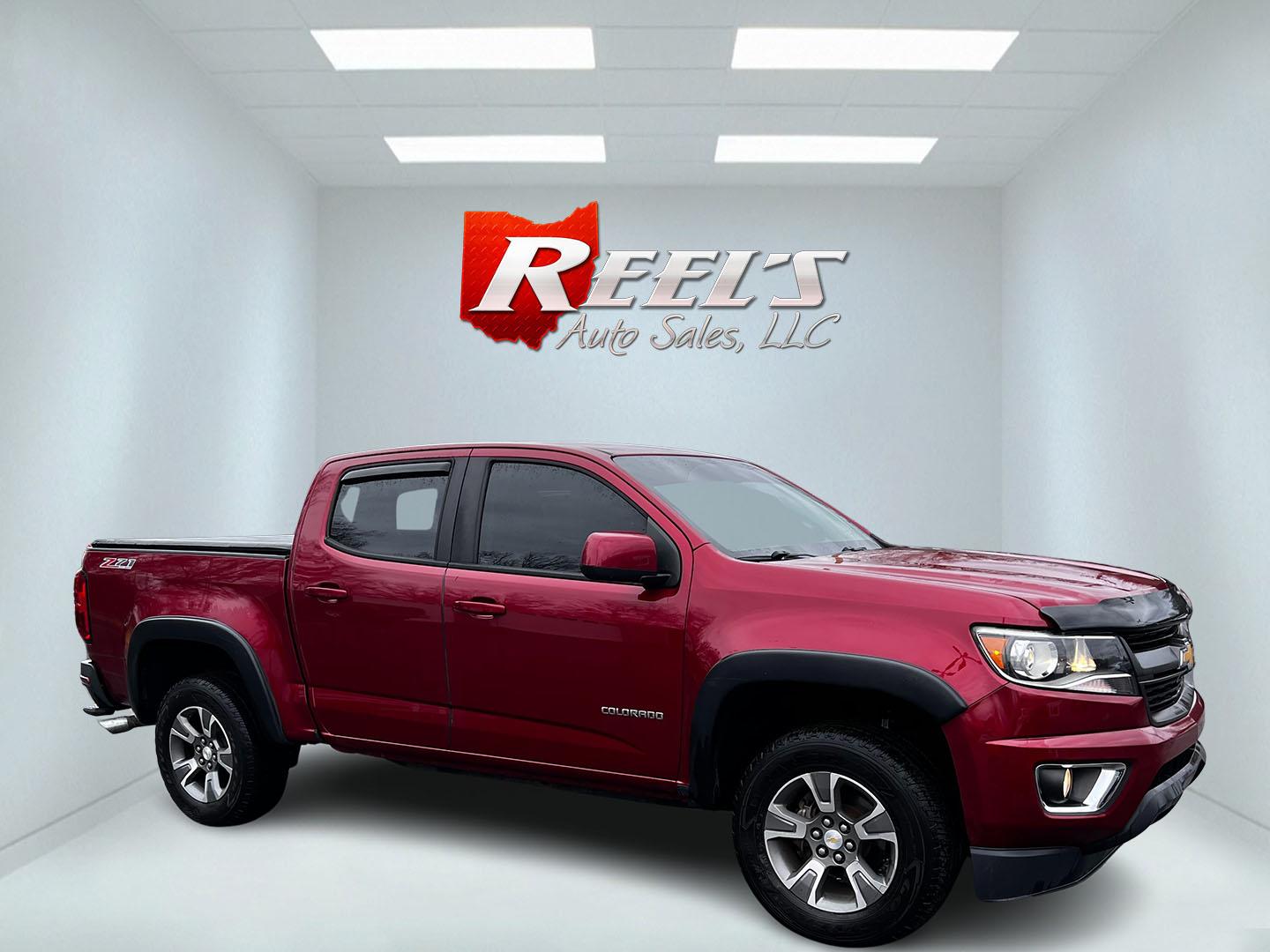 2017 Red /Black Chevrolet Colorado Z71 Crew Cab 4WD Short Box (1GCGTDEN9H1) with an 3.6L V6 DOHC 24V GAS engine, 8-Speed Automatic transmission, located at 547 E. Main St., Orwell, OH, 44076, (440) 437-5893, 41.535435, -80.847855 - This 2017 Chevrolet Colorado Z71 Crew Cab 4WD is equipped with a 3.6-liter V6 engine paired with a 8-speed automatic transmission, providing a towing capacity of 7,600 pounds, making it practical for both everyday use and heavier towing tasks. Offering up to 24 MPG on the highway, it balances perfor - Photo#3