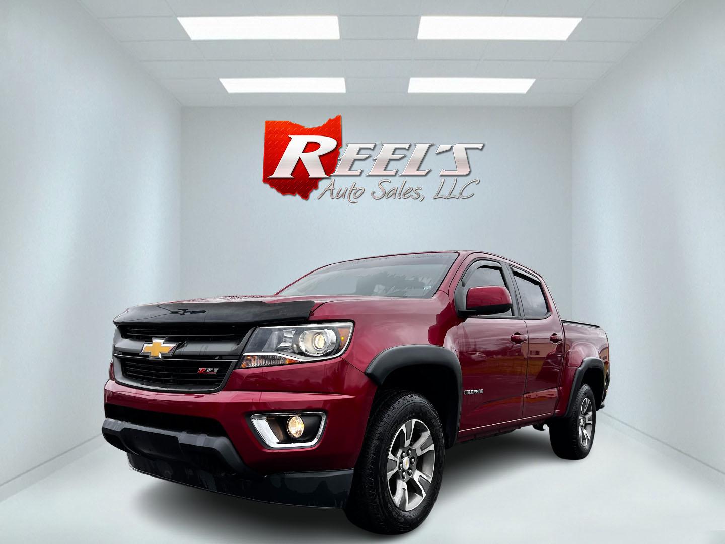 2017 Red /Black Chevrolet Colorado Z71 Crew Cab 4WD Short Box (1GCGTDEN9H1) with an 3.6L V6 DOHC 24V GAS engine, 8-Speed Automatic transmission, located at 547 E. Main St., Orwell, OH, 44076, (440) 437-5893, 41.535435, -80.847855 - This 2017 Chevrolet Colorado Z71 Crew Cab 4WD is equipped with a 3.6-liter V6 engine paired with a 8-speed automatic transmission, providing a towing capacity of 7,600 pounds, making it practical for both everyday use and heavier towing tasks. Offering up to 24 MPG on the highway, it balances perfor - Photo#0