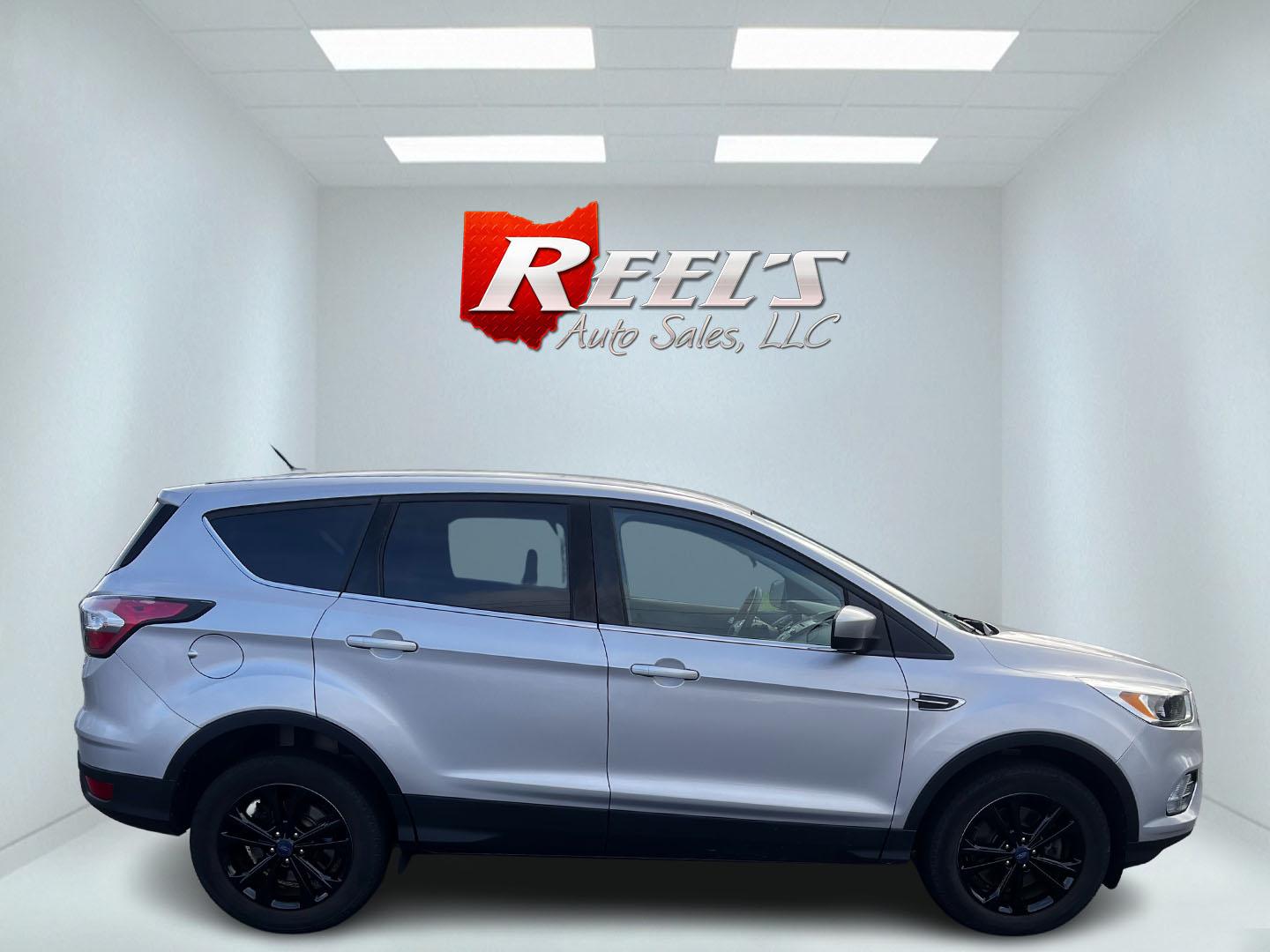 2017 Silver /Black Ford Escape SE 4WD (1FMCU9GD8HU) with an 1.5L I4 DOHC 16V TURBO engine, 6A transmission, located at 11115 Chardon Rd. , Chardon, OH, 44024, (440) 214-9705, 41.580246, -81.241943 - Photo#4