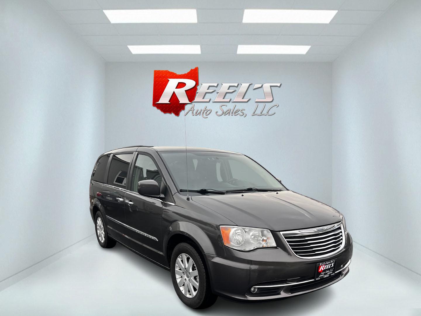 2016 Gray /Black Chrysler Town & Country Touring (2C4RC1BG5GR) with an 3.6L V6 DOHC 24V FFV engine, 6A transmission, located at 11115 Chardon Rd. , Chardon, OH, 44024, (440) 214-9705, 41.580246, -81.241943 - This 2016 Chrysler Town & Country Touring is a family-friendly minivan powered by a 3.6L Pentastar V6 engine paired with a 6-speed automatic transmission, and offers flexibility with its flex-fuel capability. It provides a comfortable and luxurious interior with leather seating, heated front seats, - Photo#2