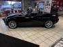 2012 Black /Black Mazda MX-5 Miata Grand Touring (JM1NC2PFXC0) with an 2.0L I4 DOHC 16V engine, 6 Speed Automatic transmission, located at 547 E. Main St., Orwell, OH, 44076, (440) 437-5893, 41.535435, -80.847855 - This 2012 Mazda MX-5 Miata Grand Touring with a hardtop features a 2.0-liter inline-four engine paired with a 6-speed automatic transmission, making it a stylish and sporty option for roadster enthusiasts. It comes equipped with HID headlights that enhance visibility and a premium leather interior g - Photo#12