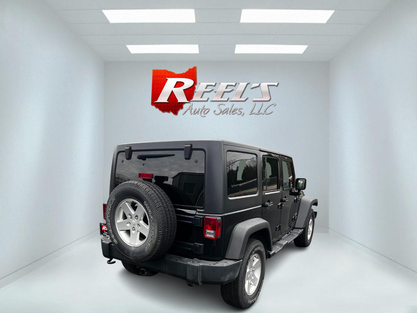 2015 Jeep Wrangler Unlimited Sport 4WD (1C4BJWDG6FL) with an 3.6L V6 DOHC 24V FFV engine, located at 547 E. Main St., Orwell, OH, 44076, (440) 437-5893, 41.535435, -80.847855 - This 2015 Jeep Wrangler Unlimited Sport is a versatile off-road vehicle powered by a 3.6-liter Pentastar V6 engine, known for its robust performance. It is equipped with a 5-speed automatic transmission that aids in seamless gear transitions. Notable for its off-road prowess, the Wrangler features a - Photo#5